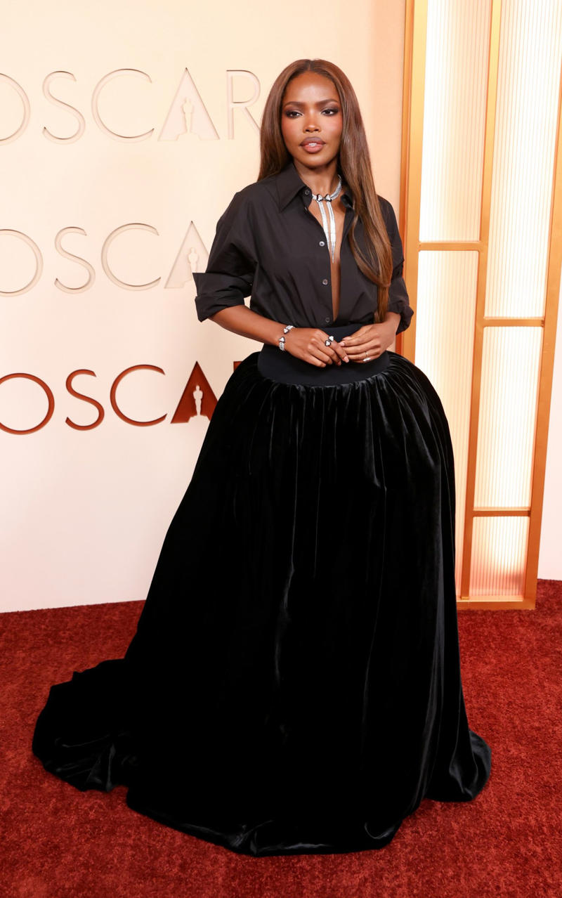 Ryan Destiny Oscars 2026, Jane Fonda, Sarah Pidgeon in Calvin Klein, Olivia Rodrigo in Saint Laurent, Naomi Watts in Balenciaga, Monica Lewinsky in Oscar de la Renta, Kim Kardashian in Gucci, Wendi Deng Murdoch and Grace Murdoch, Minnie Driver, Nicole Kidman, Marisa Abela in Revolve, Zoe Saldana in Saint Laurent, Helen Hunt in Stella McCartney, Hailey Bieber in Giorgio Armani, Kaia Gerber in Givenchy, Colman Domingo in Jacquemus, Philippine Leroy-Beaulieu, Sir Mick Jagger and Melanie Hamrick, Jeff Goldblum and Emilie Livingston in ERL Artisanal, Cara Delevingne in Thom Browne, Karlie Kloss in Gucci, Anjelica Huston, Sarah Paulson and Holland Taylor, Leslie Mann, Meg Ryan, Lauren Sanchez Bezos and Jeff Bezos, Tracee Ellis Ross in Marine Serre, Dree Hemingway in Conner Ives, Isla Fisher in Yara Shoemaker, Jessica Alba in Tamara Ralph, Kris Jenner in vintage Valentino, Rachel Sennott in Balenciaga, Dua Lipa and Callum Turner, Kristen Wiig in Monse, Elle and Dakota Fanning, Simone Ashley, Laura Harrier in Gucci, Kendall Jenner in Chanel, Grace Gummer, Mamie Gummer, Louisa Jacobson in Khaite, Suki Waterhouse and Robert Pattinson, Rita Ora in Tamara Ralph, Jessie Buckley in Chanel, Nicole Kidman in Chanel, Rose Byrne in Dior, Teyana Taylor in Chanel, Renate Reinsve in Louis Vuitton, Timothée Chalamet in Givenchy, Kylie Jenner in Schiaparelli, Demi Moore in Gucci, Gwyneth Paltrow in Armani Privé, Michael B. Jordan in Louis Vuitton, Zendaya and Robert Pattinson, Emma Stone in Louis Vuitton, Kate Hudson and Goldie Hawn, Chase Infiniti in Louis Vuitton, Felicity Jones in Prada, Anne Hathaway in Valentino, Odessa A’zion in Valentino, Wunmi Mosaku in Louis Vuitton, Elle Fanning in Givenchy, Kirsten Dunst and Jesse Plemons, Amy Madigan in Dior, Zoe Saldaña in Saint Laurent, Mia Goth in Dior, Paul Mescal and Gracie Abrams, Inga Ibsdotter Lilleaas in Loewe, Mikey Madison in Dior, Rachel McAdams in Alberta Ferretti, Mckenna Grace, Pedro Pascal in Chanel, Barbie Ferreira in GapStudio, Adrien Brody in Gucci, Jacob Elordi in Bottega Veneta, Charithra Chandran in Miss Sohee, EJAE in Dior, Audrey Nuna in Thom Browne, Rei Ami in Rahul Mishra, Huma Abedin and Anna Wintour, Leonardo DiCaprio in Dior, Kate Hawley, Damson Idris in Prada, Sigourney Weaver in Valentino, Alana Haim in Louis Vuitton, Heidi Klum, Hudson Williams in Balenciaga, Alicia Silverstone, Channing Tatum in Versace, Kathy Bates, Chloe Zhao, Joel Edgerton, Misty Copeland in David Koma, Maya Rudolph in Chanel, Ava DuVernay in Louis Vuitton, Anna Wintour, Benicio Del Toro in Giorgio Armani, Usher in Giuliva Heritage, Melissa McCarthy, Jack O’Connell in Dunhill, Lola Kirke in Simone Rocha, Fran Drescher in Ami, Jason Bateman in Dunhill, Ariana Greenblatt in John Galliano, Stellan Skarsgård, Kristen Wiig in Elie Saab, Jacobi Jupe, Kieran Culkin in Paul Smith, Nick Jonas and Priyanka Chopra Jonas, Wagner Moura in Zegna, Conan O’Brien, Vicky Krieps in Bottega Veneta, Ethan Hawke, Shaboozey in Campillo, Spike Lee, Joe Alwyn in Valentino, Kevin O’Leary, Ryan Destiny in Ami, Javier Bardem, Mark Strong in Giorgio Armani, Felix Kammerer in Saint Laurent, Ginnifer Goodwin in Monse, Susie and Nick Cave, Amelia Dimoldenberg in Ralph Lauren, Manu Rios in Saint Laurent