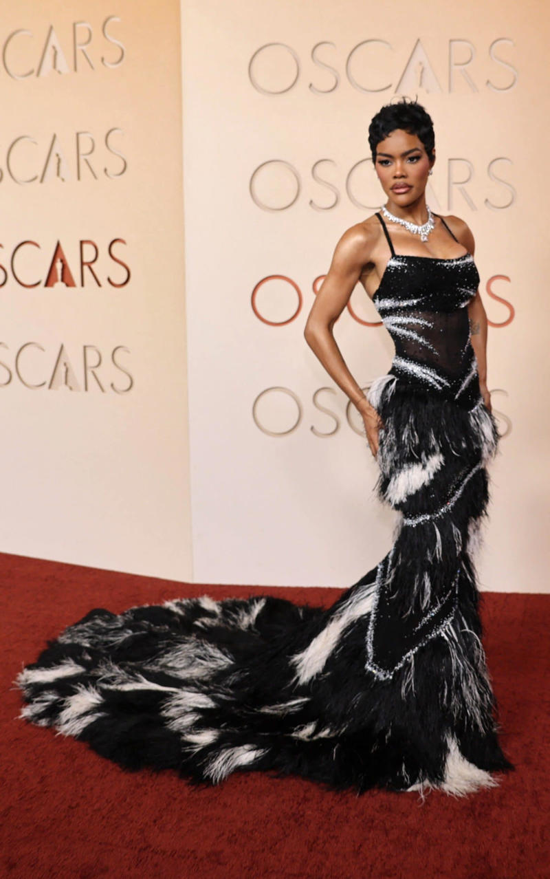 Teyana Taylor Oscars 2026, Jane Fonda, Sarah Pidgeon in Calvin Klein, Olivia Rodrigo in Saint Laurent, Naomi Watts in Balenciaga, Monica Lewinsky in Oscar de la Renta, Kim Kardashian in Gucci, Wendi Deng Murdoch and Grace Murdoch, Minnie Driver, Nicole Kidman, Marisa Abela in Revolve, Zoe Saldana in Saint Laurent, Helen Hunt in Stella McCartney, Hailey Bieber in Giorgio Armani, Kaia Gerber in Givenchy, Colman Domingo in Jacquemus, Philippine Leroy-Beaulieu, Sir Mick Jagger and Melanie Hamrick, Jeff Goldblum and Emilie Livingston in ERL Artisanal, Cara Delevingne in Thom Browne, Karlie Kloss in Gucci, Anjelica Huston, Sarah Paulson and Holland Taylor, Leslie Mann, Meg Ryan, Lauren Sanchez Bezos and Jeff Bezos, Tracee Ellis Ross in Marine Serre, Dree Hemingway in Conner Ives, Isla Fisher in Yara Shoemaker, Jessica Alba in Tamara Ralph, Kris Jenner in vintage Valentino, Rachel Sennott in Balenciaga, Dua Lipa and Callum Turner, Kristen Wiig in Monse, Elle and Dakota Fanning, Simone Ashley, Laura Harrier in Gucci, Kendall Jenner in Chanel, Grace Gummer, Mamie Gummer, Louisa Jacobson in Khaite, Suki Waterhouse and Robert Pattinson, Rita Ora in Tamara Ralph, Jessie Buckley in Chanel, Nicole Kidman in Chanel, Rose Byrne in Dior, Teyana Taylor in Chanel, Renate Reinsve in Louis Vuitton, Timothée Chalamet in Givenchy, Kylie Jenner in Schiaparelli, Demi Moore in Gucci, Gwyneth Paltrow in Armani Privé, Michael B. Jordan in Louis Vuitton, Zendaya and Robert Pattinson, Emma Stone in Louis Vuitton, Kate Hudson and Goldie Hawn, Chase Infiniti in Louis Vuitton, Felicity Jones in Prada, Anne Hathaway in Valentino, Odessa A’zion in Valentino, Wunmi Mosaku in Louis Vuitton, Elle Fanning in Givenchy, Kirsten Dunst and Jesse Plemons, Amy Madigan in Dior, Zoe Saldaña in Saint Laurent, Mia Goth in Dior, Paul Mescal and Gracie Abrams, Inga Ibsdotter Lilleaas in Loewe, Mikey Madison in Dior, Rachel McAdams in Alberta Ferretti, Mckenna Grace, Pedro Pascal in Chanel, Barbie Ferreira in GapStudio, Adrien Brody in Gucci, Jacob Elordi in Bottega Veneta, Charithra Chandran in Miss Sohee, EJAE in Dior, Audrey Nuna in Thom Browne, Rei Ami in Rahul Mishra, Huma Abedin and Anna Wintour, Leonardo DiCaprio in Dior, Kate Hawley, Damson Idris in Prada, Sigourney Weaver in Valentino, Alana Haim in Louis Vuitton, Heidi Klum, Hudson Williams in Balenciaga, Alicia Silverstone, Channing Tatum in Versace, Kathy Bates, Chloe Zhao, Joel Edgerton, Misty Copeland in David Koma, Maya Rudolph in Chanel, Ava DuVernay in Louis Vuitton, Anna Wintour, Benicio Del Toro in Giorgio Armani, Usher in Giuliva Heritage, Melissa McCarthy, Jack O’Connell in Dunhill, Lola Kirke in Simone Rocha, Fran Drescher in Ami, Jason Bateman in Dunhill, Ariana Greenblatt in John Galliano, Stellan Skarsgård, Kristen Wiig in Elie Saab, Jacobi Jupe, Kieran Culkin in Paul Smith, Nick Jonas and Priyanka Chopra Jonas, Wagner Moura in Zegna, Conan O’Brien, Vicky Krieps in Bottega Veneta, Ethan Hawke, Shaboozey in Campillo, Spike Lee, Joe Alwyn in Valentino, Kevin O’Leary, Ryan Destiny in Ami, Javier Bardem, Mark Strong in Giorgio Armani, Felix Kammerer in Saint Laurent, Ginnifer Goodwin in Monse, Susie and Nick Cave, Amelia Dimoldenberg in Ralph Lauren, Manu Rios in Saint Laurent