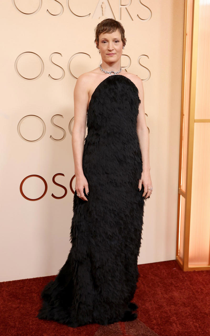 Vicky Krieps Oscars 2026, Jane Fonda, Sarah Pidgeon in Calvin Klein, Olivia Rodrigo in Saint Laurent, Naomi Watts in Balenciaga, Monica Lewinsky in Oscar de la Renta, Kim Kardashian in Gucci, Wendi Deng Murdoch and Grace Murdoch, Minnie Driver, Nicole Kidman, Marisa Abela in Revolve, Zoe Saldana in Saint Laurent, Helen Hunt in Stella McCartney, Hailey Bieber in Giorgio Armani, Kaia Gerber in Givenchy, Colman Domingo in Jacquemus, Philippine Leroy-Beaulieu, Sir Mick Jagger and Melanie Hamrick, Jeff Goldblum and Emilie Livingston in ERL Artisanal, Cara Delevingne in Thom Browne, Karlie Kloss in Gucci, Anjelica Huston, Sarah Paulson and Holland Taylor, Leslie Mann, Meg Ryan, Lauren Sanchez Bezos and Jeff Bezos, Tracee Ellis Ross in Marine Serre, Dree Hemingway in Conner Ives, Isla Fisher in Yara Shoemaker, Jessica Alba in Tamara Ralph, Kris Jenner in vintage Valentino, Rachel Sennott in Balenciaga, Dua Lipa and Callum Turner, Kristen Wiig in Monse, Elle and Dakota Fanning, Simone Ashley, Laura Harrier in Gucci, Kendall Jenner in Chanel, Grace Gummer, Mamie Gummer, Louisa Jacobson in Khaite, Suki Waterhouse and Robert Pattinson, Rita Ora in Tamara Ralph, Jessie Buckley in Chanel, Nicole Kidman in Chanel, Rose Byrne in Dior, Teyana Taylor in Chanel, Renate Reinsve in Louis Vuitton, Timothée Chalamet in Givenchy, Kylie Jenner in Schiaparelli, Demi Moore in Gucci, Gwyneth Paltrow in Armani Privé, Michael B. Jordan in Louis Vuitton, Zendaya and Robert Pattinson, Emma Stone in Louis Vuitton, Kate Hudson and Goldie Hawn, Chase Infiniti in Louis Vuitton, Felicity Jones in Prada, Anne Hathaway in Valentino, Odessa A’zion in Valentino, Wunmi Mosaku in Louis Vuitton, Elle Fanning in Givenchy, Kirsten Dunst and Jesse Plemons, Amy Madigan in Dior, Zoe Saldaña in Saint Laurent, Mia Goth in Dior, Paul Mescal and Gracie Abrams, Inga Ibsdotter Lilleaas in Loewe, Mikey Madison in Dior, Rachel McAdams in Alberta Ferretti, Mckenna Grace, Pedro Pascal in Chanel, Barbie Ferreira in GapStudio, Adrien Brody in Gucci, Jacob Elordi in Bottega Veneta, Charithra Chandran in Miss Sohee, EJAE in Dior, Audrey Nuna in Thom Browne, Rei Ami in Rahul Mishra, Huma Abedin and Anna Wintour, Leonardo DiCaprio in Dior, Kate Hawley, Damson Idris in Prada, Sigourney Weaver in Valentino, Alana Haim in Louis Vuitton, Heidi Klum, Hudson Williams in Balenciaga, Alicia Silverstone, Channing Tatum in Versace, Kathy Bates, Chloe Zhao, Joel Edgerton, Misty Copeland in David Koma, Maya Rudolph in Chanel, Ava DuVernay in Louis Vuitton, Anna Wintour, Benicio Del Toro in Giorgio Armani, Usher in Giuliva Heritage, Melissa McCarthy, Jack O’Connell in Dunhill, Lola Kirke in Simone Rocha, Fran Drescher in Ami, Jason Bateman in Dunhill, Ariana Greenblatt in John Galliano, Stellan Skarsgård, Kristen Wiig in Elie Saab, Jacobi Jupe, Kieran Culkin in Paul Smith, Nick Jonas and Priyanka Chopra Jonas, Wagner Moura in Zegna, Conan O’Brien, Vicky Krieps in Bottega Veneta, Ethan Hawke, Shaboozey in Campillo, Spike Lee, Joe Alwyn in Valentino, Kevin O’Leary, Ryan Destiny in Ami, Javier Bardem, Mark Strong in Giorgio Armani, Felix Kammerer in Saint Laurent, Ginnifer Goodwin in Monse, Susie and Nick Cave, Amelia Dimoldenberg in Ralph Lauren, Manu Rios in Saint Laurent