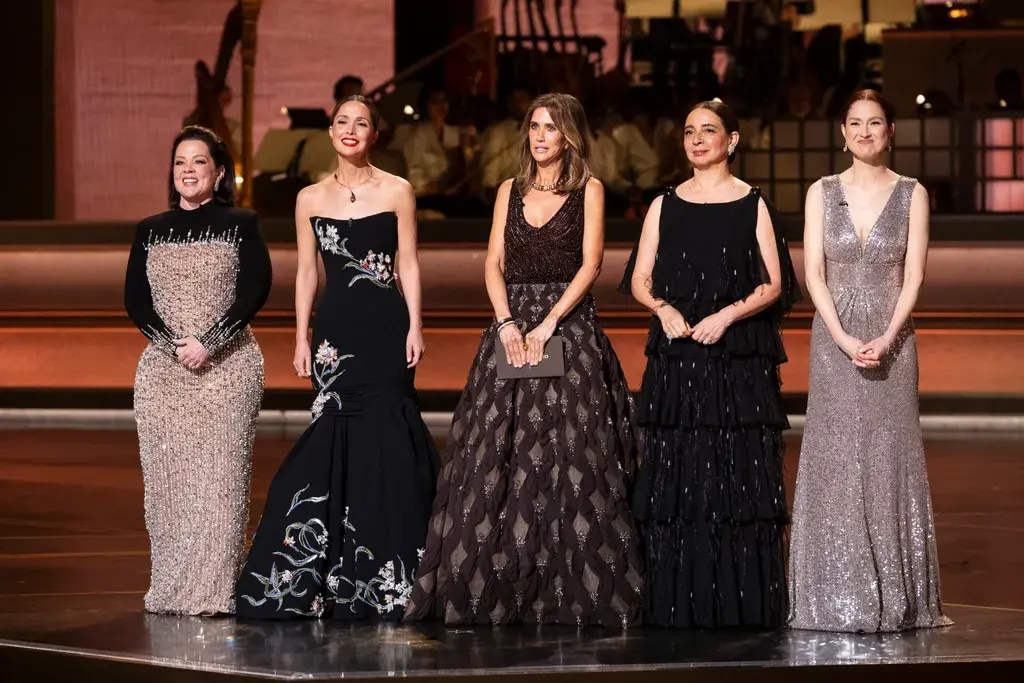 All Of Our Favourite Moments From The 2026 Oscars, Anna Wintour And Anne Hathaway Present In-Character, Ballerina Misty Copeland Performs During Sinners Musical Tribute, Come Good-Natured Ribbing At Timothée Chalamet’s Expense, A Moving In Memoriam, Bridesmaids Cast Reunites On-Stage, ‘Golden’ From KPop Demon Hunters Makes History, Robert Downey Jr. Presented Chris Evans With A Sparkly Thong, Michael B Jordan Wins Best Actor For Sinners, Jessie Buckley Wins Best Actress For Hamnet, One Battle After Another Takes Home Best Picture