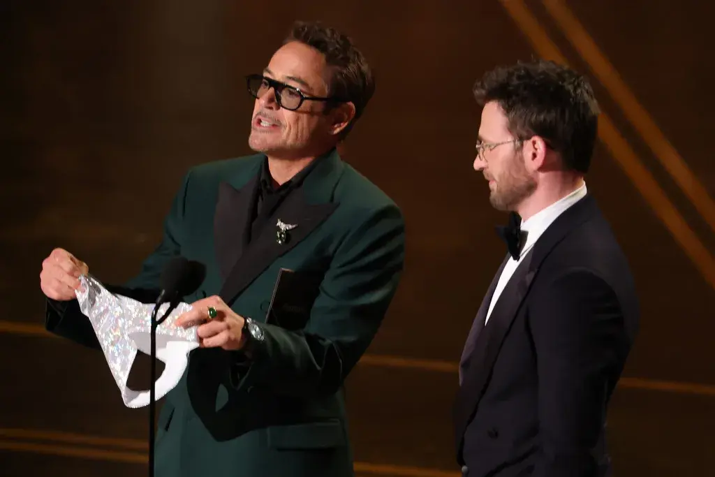 All Of Our Favourite Moments From The 2026 Oscars, Anna Wintour And Anne Hathaway Present In-Character, Ballerina Misty Copeland Performs During Sinners Musical Tribute, Come Good-Natured Ribbing At Timothée Chalamet’s Expense, A Moving In Memoriam, Bridesmaids Cast Reunites On-Stage, ‘Golden’ From KPop Demon Hunters Makes History, Robert Downey Jr. Presented Chris Evans With A Sparkly Thong, Michael B Jordan Wins Best Actor For Sinners, Jessie Buckley Wins Best Actress For Hamnet, One Battle After Another Takes Home Best Picture