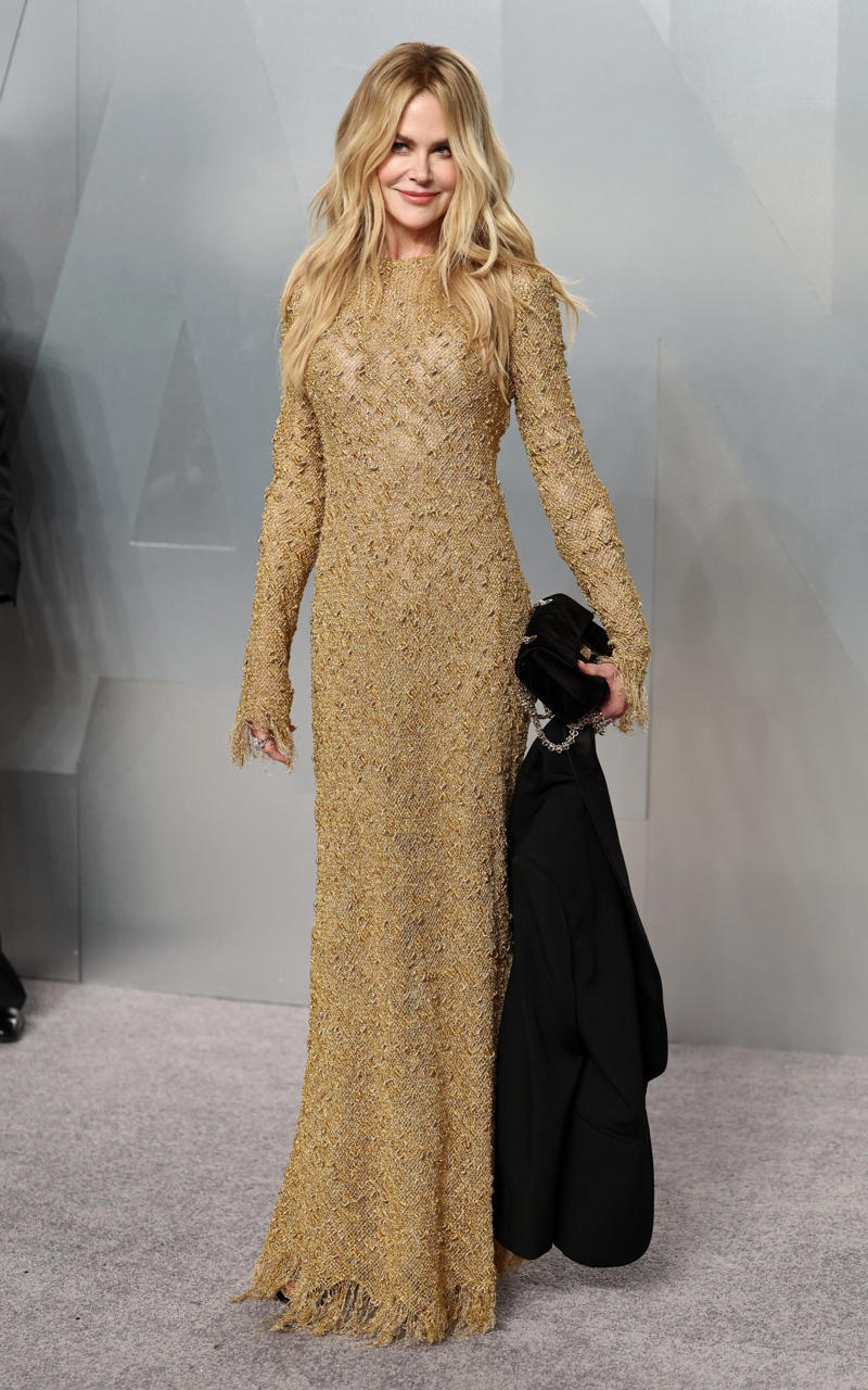 Nicole Kidman Oscars 2026, Jane Fonda, Sarah Pidgeon in Calvin Klein, Olivia Rodrigo in Saint Laurent, Naomi Watts in Balenciaga, Monica Lewinsky in Oscar de la Renta, Kim Kardashian in Gucci, Wendi Deng Murdoch and Grace Murdoch, Minnie Driver, Nicole Kidman, Marisa Abela in Revolve, Zoe Saldana in Saint Laurent, Helen Hunt in Stella McCartney, Hailey Bieber in Giorgio Armani, Kaia Gerber in Givenchy, Colman Domingo in Jacquemus, Philippine Leroy-Beaulieu, Sir Mick Jagger and Melanie Hamrick, Jeff Goldblum and Emilie Livingston in ERL Artisanal, Cara Delevingne in Thom Browne, Karlie Kloss in Gucci, Anjelica Huston, Sarah Paulson and Holland Taylor, Leslie Mann, Meg Ryan, Lauren Sanchez Bezos and Jeff Bezos, Tracee Ellis Ross in Marine Serre, Dree Hemingway in Conner Ives, Isla Fisher in Yara Shoemaker, Jessica Alba in Tamara Ralph, Kris Jenner in vintage Valentino, Rachel Sennott in Balenciaga, Dua Lipa and Callum Turner, Kristen Wiig in Monse, Elle and Dakota Fanning, Simone Ashley, Laura Harrier in Gucci, Kendall Jenner in Chanel, Grace Gummer, Mamie Gummer, Louisa Jacobson in Khaite, Suki Waterhouse and Robert Pattinson, Rita Ora in Tamara Ralph, Jessie Buckley in Chanel, Nicole Kidman in Chanel, Rose Byrne in Dior, Teyana Taylor in Chanel, Renate Reinsve in Louis Vuitton, Timothée Chalamet in Givenchy, Kylie Jenner in Schiaparelli, Demi Moore in Gucci, Gwyneth Paltrow in Armani Privé, Michael B. Jordan in Louis Vuitton, Zendaya and Robert Pattinson, Emma Stone in Louis Vuitton, Kate Hudson and Goldie Hawn, Chase Infiniti in Louis Vuitton, Felicity Jones in Prada, Anne Hathaway in Valentino, Odessa A’zion in Valentino, Wunmi Mosaku in Louis Vuitton, Elle Fanning in Givenchy, Kirsten Dunst and Jesse Plemons, Amy Madigan in Dior, Zoe Saldaña in Saint Laurent, Mia Goth in Dior, Paul Mescal and Gracie Abrams, Inga Ibsdotter Lilleaas in Loewe, Mikey Madison in Dior, Rachel McAdams in Alberta Ferretti, Mckenna Grace, Pedro Pascal in Chanel, Barbie Ferreira in GapStudio, Adrien Brody in Gucci, Jacob Elordi in Bottega Veneta, Charithra Chandran in Miss Sohee, EJAE in Dior, Audrey Nuna in Thom Browne, Rei Ami in Rahul Mishra, Huma Abedin and Anna Wintour, Leonardo DiCaprio in Dior, Kate Hawley, Damson Idris in Prada, Sigourney Weaver in Valentino, Alana Haim in Louis Vuitton, Heidi Klum, Hudson Williams in Balenciaga, Alicia Silverstone, Channing Tatum in Versace, Kathy Bates, Chloe Zhao, Joel Edgerton, Misty Copeland in David Koma, Maya Rudolph in Chanel, Ava DuVernay in Louis Vuitton, Anna Wintour, Benicio Del Toro in Giorgio Armani, Usher in Giuliva Heritage, Melissa McCarthy, Jack O’Connell in Dunhill, Lola Kirke in Simone Rocha, Fran Drescher in Ami, Jason Bateman in Dunhill, Ariana Greenblatt in John Galliano, Stellan Skarsgård, Kristen Wiig in Elie Saab, Jacobi Jupe, Kieran Culkin in Paul Smith, Nick Jonas and Priyanka Chopra Jonas, Wagner Moura in Zegna, Conan O’Brien, Vicky Krieps in Bottega Veneta, Ethan Hawke, Shaboozey in Campillo, Spike Lee, Joe Alwyn in Valentino, Kevin O’Leary, Ryan Destiny in Ami, Javier Bardem, Mark Strong in Giorgio Armani, Felix Kammerer in Saint Laurent, Ginnifer Goodwin in Monse, Susie and Nick Cave, Amelia Dimoldenberg in Ralph Lauren, Manu Rios in Saint Laurent