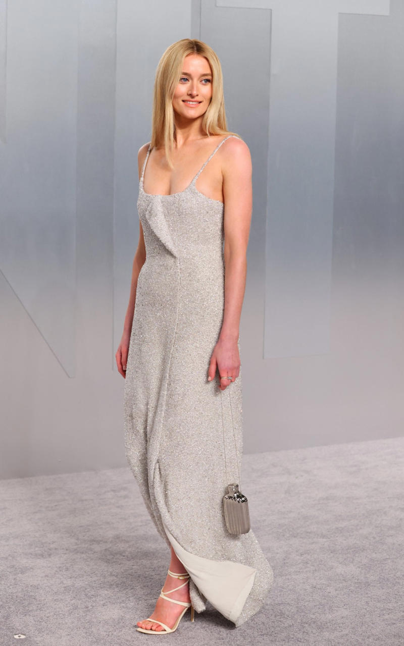 Sarah Pidgeon in Calvin Klein Oscars 2026, Jane Fonda, Sarah Pidgeon in Calvin Klein, Olivia Rodrigo in Saint Laurent, Naomi Watts in Balenciaga, Monica Lewinsky in Oscar de la Renta, Kim Kardashian in Gucci, Wendi Deng Murdoch and Grace Murdoch, Minnie Driver, Nicole Kidman, Marisa Abela in Revolve, Zoe Saldana in Saint Laurent, Helen Hunt in Stella McCartney, Hailey Bieber in Giorgio Armani, Kaia Gerber in Givenchy, Colman Domingo in Jacquemus, Philippine Leroy-Beaulieu, Sir Mick Jagger and Melanie Hamrick, Jeff Goldblum and Emilie Livingston in ERL Artisanal, Cara Delevingne in Thom Browne, Karlie Kloss in Gucci, Anjelica Huston, Sarah Paulson and Holland Taylor, Leslie Mann, Meg Ryan, Lauren Sanchez Bezos and Jeff Bezos, Tracee Ellis Ross in Marine Serre, Dree Hemingway in Conner Ives, Isla Fisher in Yara Shoemaker, Jessica Alba in Tamara Ralph, Kris Jenner in vintage Valentino, Rachel Sennott in Balenciaga, Dua Lipa and Callum Turner, Kristen Wiig in Monse, Elle and Dakota Fanning, Simone Ashley, Laura Harrier in Gucci, Kendall Jenner in Chanel, Grace Gummer, Mamie Gummer, Louisa Jacobson in Khaite, Suki Waterhouse and Robert Pattinson, Rita Ora in Tamara Ralph, Jessie Buckley in Chanel, Nicole Kidman in Chanel, Rose Byrne in Dior, Teyana Taylor in Chanel, Renate Reinsve in Louis Vuitton, Timothée Chalamet in Givenchy, Kylie Jenner in Schiaparelli, Demi Moore in Gucci, Gwyneth Paltrow in Armani Privé, Michael B. Jordan in Louis Vuitton, Zendaya and Robert Pattinson, Emma Stone in Louis Vuitton, Kate Hudson and Goldie Hawn, Chase Infiniti in Louis Vuitton, Felicity Jones in Prada, Anne Hathaway in Valentino, Odessa A’zion in Valentino, Wunmi Mosaku in Louis Vuitton, Elle Fanning in Givenchy, Kirsten Dunst and Jesse Plemons, Amy Madigan in Dior, Zoe Saldaña in Saint Laurent, Mia Goth in Dior, Paul Mescal and Gracie Abrams, Inga Ibsdotter Lilleaas in Loewe, Mikey Madison in Dior, Rachel McAdams in Alberta Ferretti, Mckenna Grace, Pedro Pascal in Chanel, Barbie Ferreira in GapStudio, Adrien Brody in Gucci, Jacob Elordi in Bottega Veneta, Charithra Chandran in Miss Sohee, EJAE in Dior, Audrey Nuna in Thom Browne, Rei Ami in Rahul Mishra, Huma Abedin and Anna Wintour, Leonardo DiCaprio in Dior, Kate Hawley, Damson Idris in Prada, Sigourney Weaver in Valentino, Alana Haim in Louis Vuitton, Heidi Klum, Hudson Williams in Balenciaga, Alicia Silverstone, Channing Tatum in Versace, Kathy Bates, Chloe Zhao, Joel Edgerton, Misty Copeland in David Koma, Maya Rudolph in Chanel, Ava DuVernay in Louis Vuitton, Anna Wintour, Benicio Del Toro in Giorgio Armani, Usher in Giuliva Heritage, Melissa McCarthy, Jack O’Connell in Dunhill, Lola Kirke in Simone Rocha, Fran Drescher in Ami, Jason Bateman in Dunhill, Ariana Greenblatt in John Galliano, Stellan Skarsgård, Kristen Wiig in Elie Saab, Jacobi Jupe, Kieran Culkin in Paul Smith, Nick Jonas and Priyanka Chopra Jonas, Wagner Moura in Zegna, Conan O’Brien, Vicky Krieps in Bottega Veneta, Ethan Hawke, Shaboozey in Campillo, Spike Lee, Joe Alwyn in Valentino, Kevin O’Leary, Ryan Destiny in Ami, Javier Bardem, Mark Strong in Giorgio Armani, Felix Kammerer in Saint Laurent, Ginnifer Goodwin in Monse, Susie and Nick Cave, Amelia Dimoldenberg in Ralph Lauren, Manu Rios in Saint Laurent