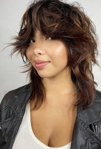 Textured Collarbone Cut, Shaped Bob, Curtain Bangs, Layered Mid-Length Curls, Modern Mullet, Long Layers, Asymmetrical Lob, Rounded Bob, Girly Shag, Asymmetrical Pixie, Layered Long Curls, Deep Side Part, Classic Hollywood Cut, Top-Heavy Shag, Face-Framing Shoulder Cut, Bob with Hidden Layers, Longer Curtain Bangs, Subtle A-Line Length, Wispy Curls, Cascading Curls, Flipped Bob, Side Bangs, Frenchie Bangs, Curly Cropped Cut, French Bob, Curl-Boosting Layers, Casual Chin Bob, Short Shag Cut, Face Framing on a Straight Cut, Grown-Out Curtain Bangs, Brunette Beach Waves, Layered Curtain Bangs, Bob with Bangs, Micro Bangs