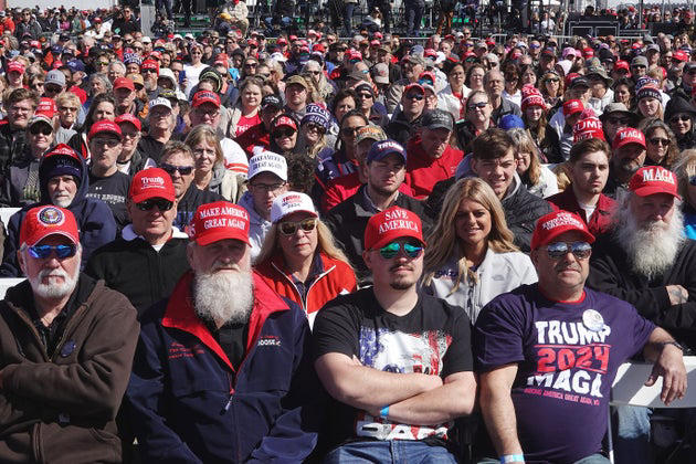 Wraparound Sunglasses, Baseball Caps, Especially In Red And Camo, The All-Black Tech Bro Look, Uber-Tight Shirts And Pants, Tactical And Military-Inspired Gear, Red, White And Blue ... And Gold, Polos, Khakis And Other Preppy Country Club Fare, Florsheims And Boat Shoes, Boxy Suits With Extra-Long ‘Power’ Ties