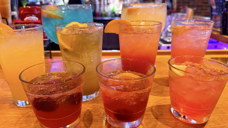 9. Island Cooler, 8. Long Island Iced Tea (L.I.T.), 7. Old fashioned, 6. Texas Peach Fuzz, 5. Jamaican Cowboy, 4. Porch Rocker, 3. Dale Yeah!, 2. Pink Sunset, 1. Midnight Sour