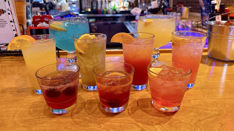 9. Island Cooler, 8. Long Island Iced Tea (L.I.T.), 7. Old fashioned, 6. Texas Peach Fuzz, 5. Jamaican Cowboy, 4. Porch Rocker, 3. Dale Yeah!, 2. Pink Sunset, 1. Midnight Sour