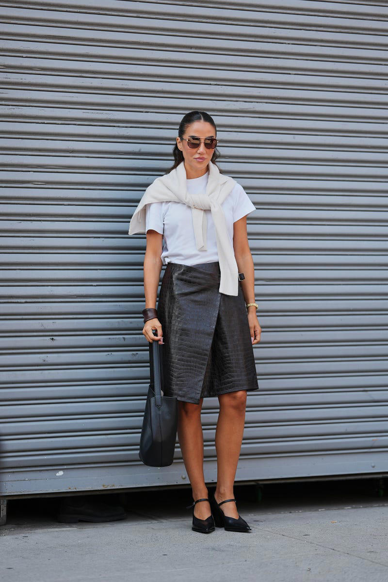 Shop the Best White T-Shirts, A Baby Tee and Straight-Leg Denim, A Relaxed T-Shirt and Brown Jacket, A Boxy Style and Classic Trench, A Monochrome Combination, Black Capris and Ballet Flats, A Statement Skirt and Wool Sweater, A Matching Suit Set, A Tailored Jacket and Pleated Skirt, White Linen Shorts and Leather Boots