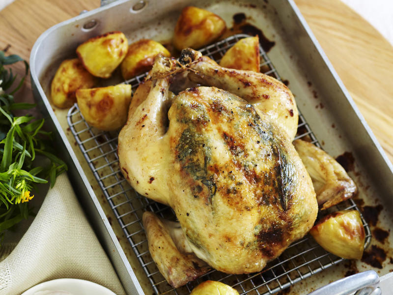 How to tell if your roast chicken is cooked,          Garlic butter roast chicken with heirloom tomatoes      ,          Best-ever air fryer roast chicken      ,          Roast chicken with cheesy green polenta      ,          Butterflied soy and ginger chicken      ,          Classic roast chicken with gravy      ,          Air fryer roast chicken with secret herbs and spices      ,          Chicken and artichoke pot roast      ,          French-style roast chicken      ,          Butterflied roast chicken with leek      ,          Roasted sumac chicken with baby vegetables      ,          Classic roast chicken      ,          Chicken in a pot      ,          Asian-style roast chicken      ,          Spanish-style roast chicken      ,          Cajun roast chicken with corn cream      ,          Moroccan roast chicken and cauliflower      ,          Tea brined roasted chicken      ,          Roast chicken with lemon and garlic      ,          Mustard roast chicken      ,          Paprika roast chicken with corn and polenta stuffing      ,          Roast chicken for two      ,          Roasted lemon thyme chicken      ,          Roast chicken with 40 cloves of garlic      ,          Tarragon roast chicken with crispy potatoes      ,          Garlic and oregano roast chicken      ,          Roast chicken with garlic potatoes and rosemary      ,          Lemon thyme and chilli roast chicken      ,          Roast chicken with broad beans and lemon      , Sides for your roast chicken dinner