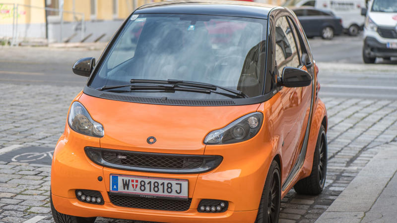 1. The City Pod (Smart Fortwo), 2. The True One-Seater (ElectraMeccanica Solo), 3. The Tiny Original (Peel P50), 4. The Open-Air Escape (Mazda MX-5 Miata), 5. The Retro Runabout (Fiat 500), 6. The High-Rev Companion (Honda S2000), 7. The Coastal Roadster (Porsche Boxster), 8. The Fuel-Sipper (Volkswagen Lupo 3L), 9. The Smart Small Car (Toyota iQ), 10. The French Minimalist (Citroën 2CV), 11. The License-Light Microcar (Aixam), 12. The Featherweight Purist (Lotus Elise), 13. The Urban EV Capsule (BMW i3), 14. The Tiny French Original (Renault Twingo), 15. The Budget Escape Car (Fiat 126), 16. The Driver’s Coupe (Subaru BRZ), 17. The Practical City Car (Kia Picanto), 18. The Vintage Backroad Sedan (Datsun 510), 19. The Silent Sports Car (Tesla Roadster), 20. The Bubble-Car Fantasy (Peel Trident)