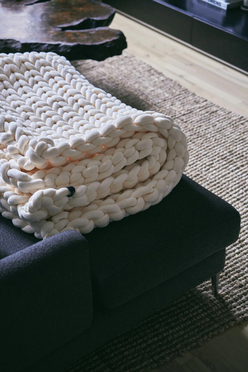 1. The woven wicker basket, 2. The sturdy jute basket, 3. The soft woven cotton basket, 4. The geometric metal basket, 5. The basket with a lid for out-of-sight storage, 6. The thick looped wool throw, 7. The lightweight embossed cotton throw, 8. The ultra-soft faux fur throw, 9. The crocheted throw, 10. The chunky-knit throw, 11. The deep velvet cushion, 12. The crinkled linen pillow, 13. The Knot Cushion, 14. The two-tone graphic pillow, 15. The giant floor cushion