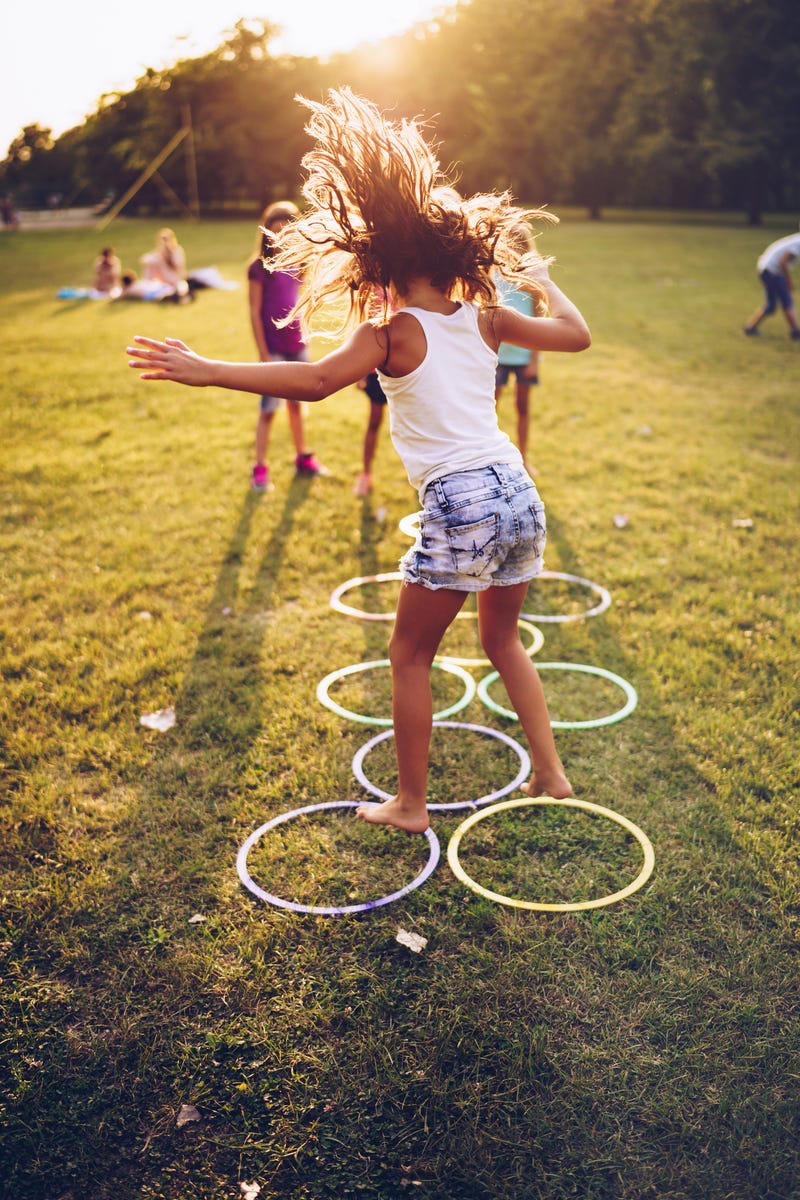 Go for a Nature Walk or Hike, Try a Color Scavenger Hunt , Search for Backyard Bugs, Play Tag Variations, Create a Nature Collage, Set Up an Obstacle Course, Build a Fairy House, Play Capture the Flag, Help With Gardening, Outdoor Storytime , Ride Bikes or Scooters, Play “What Time Is It, Mr. Fox?”, Pitch In With Outdoor Chores , Make a Mud Kitchen, Go Stargazing