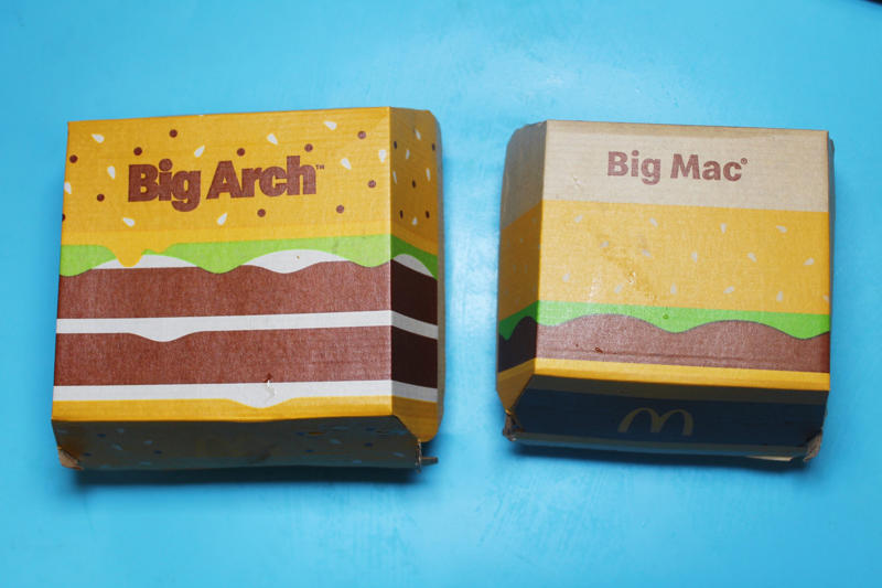 The size difference between the two burgers was obvious right away. The size difference between the two burgers was obvious right away., There was also a slight price difference., I tried the Big Mac first, even though I'd had it before., I'm typically not a huge fan of the Big Mac., I was underwhelmed by the Big Mac during this taste test, too., The Big Arch felt like McDonald's answer to a "premium" burger., The Big Arch came on a sesame seed-poppy seed bun., This burger was tasty and beyond savory.