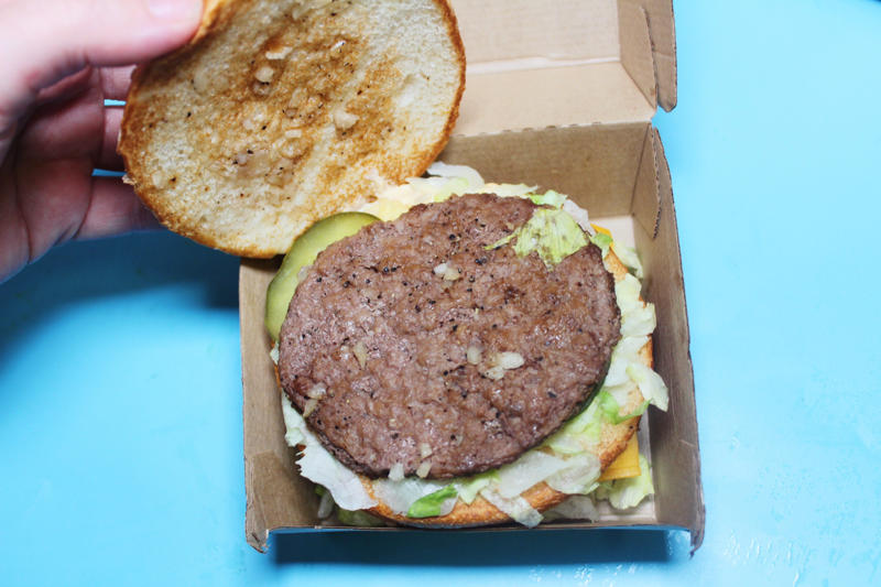 The Big Mac comes with two 1.6-ounce beef patties, pickles, shredded lettuce, chopped onions, a slice of American cheese, and layers of Big Mac sauce on a sesame-seed bun. The size difference between the two burgers was obvious right away., There was also a slight price difference., I tried the Big Mac first, even though I'd had it before., I'm typically not a huge fan of the Big Mac., I was underwhelmed by the Big Mac during this taste test, too., The Big Arch felt like McDonald's answer to a "premium" burger., The Big Arch came on a sesame seed-poppy seed bun., This burger was tasty and beyond savory.