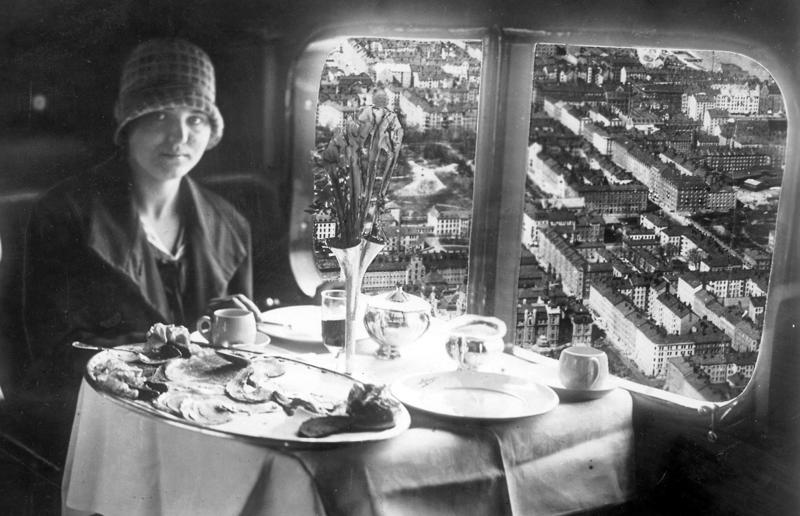 1920s: enjoying breakfast at 3,000 feet (914m) A flight back in time, 1920s: the beginnings of air travel, 1920s: a passenger compartment from the 1920s, 1920s: inside a Transcontinental Air Transport plane, 1920s: bed compartments of a German Junker aircraft, 1920s: a flight attendant serves drinks on a French Airliner service, 1920s: an early German Deutsche Luft Hansa plane, 1920s: the Dornier Do X dining salon, 1920s: the first ever in-flight movie, 1920s: enjoying breakfast at 3,000 feet (914m), 1920s: passengers get weighed before their flight, 1930s: passengers climb aboard a plane at Croydon Airport, England, 1930s: crew members check bags before a flight to LA, 1930s: the check-in desk at newly opened Gatwick Airport, 1930s: an early plane with wicker seats, 1930s: the comfortable seats of a Handley Page HP42, 1930s: a plush Imperial Airways cabin, 1930s: passengers aboard the Douglas DC-1, 1930s: a flight attendant serves tea in bed, 1930s: ladies travelling on an Eastern Air Transport plane, 1930s: chefs load up a plane with homemade treats, 1930s: women in their finest attire wait to board a plane, 1930s: passengers listen to a broadcast aboard a flight, Early 1940s: passengers on board the Junkers G.38 plane, 1940s: day cabins inside an Imperial Airways flying boat, 1940s: interior of a McDonnell Douglas DC-6, 1940s: inside a Sikorsky S-40 flying boat, Late 1930s: the early days of Pan Am, 1940s: Pan American Airlines' Boeing 314 Clipper sets off, 1940s: inside the Boeing 314 flying boat, 1940s: it wasn't cheap to fly aboard the Boeing 314, 1940s: a couple enjoys dinner aboard the Boeing 314, 1940s: the early days of Heathrow Airport, 1940s: Boeing 307 Stratoliner's cocktail lounge, 1940s: the overnight intercontinental service onboard Boeing Stratocruiser, 1940s: the communal lounge aboard a Boeing aeroplane, 1950s: guests relax in an onboard lounge compartment, 1950s: the Sky-Cot aboard a British Overseas Airways Corporation flight, 1950s: a movie projector on a United Airlines flight