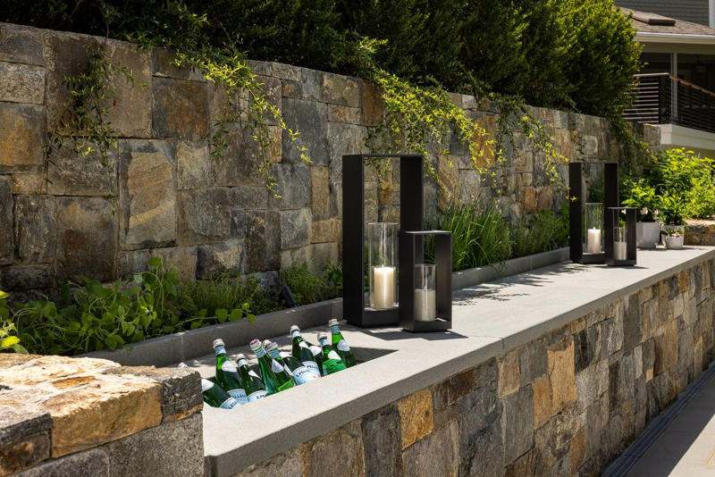 Plot Beautiful Pathways, Incorporate Lighting, Plant a Low-Maintenance, Sustainable Garden, Develop Outdoor Living Spaces, Make Difficult Terrain Usable, Keep Up with Maintenance