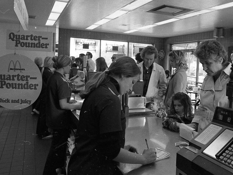 Before the introduction of high-tech cash registers, McDonald's employees would take down orders by hand to give to the kitchen.