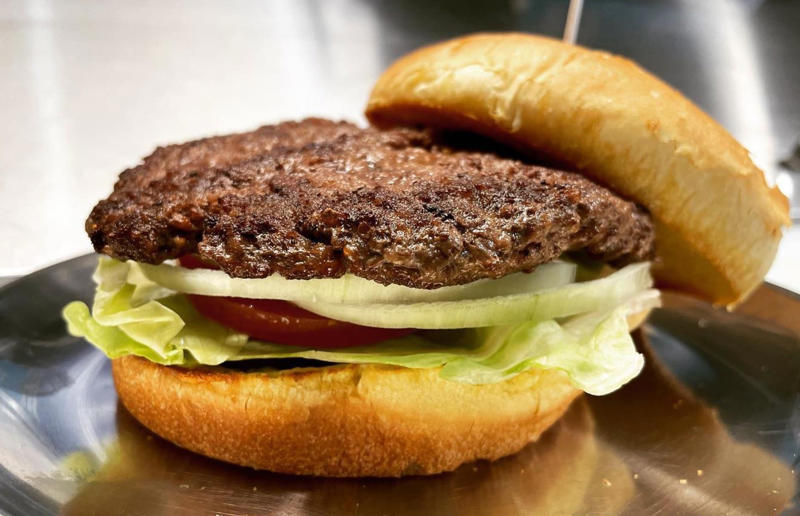 Nevada: Plain Jane, Beefy's, Reno 54. Tennessee: Dyer's Single, Dyer's Burgers, Memphis, 53. Alabama: hamburger, Dub's Burgers, Athens, 52. Connecticut: The Original Burger, Louis' Lunch, New Haven, 51. California: Steakburger, The Apple Pan, Los Angeles, 50. Iowa: hamburger, B-Bops, various locations, 49. Maine: hamburger, Black Cow, Portland, 48. New Jersey: hamburger, White Manna, Hackensack, 47. New Hampshire: hamburger, Gilley’s Diner, Portsmouth, 46. Massachusetts: Hamburg, White Hut, West Springfield, 45. California: hamburger, In-N-Out Burger, various locations, 44. District of Columbia: Farmhouse Burger, Good Stuff Eatery, Georgetown, 43. Mississippi: Slugburger, Latham's Hamburger Inn, New Albany, 42. Utah: Big Ben, Burger Bar, Roy, 41. Wisconsin: hamburger, Sobelman's Pub & Grill, Milwaukee, 40. Wyoming: The Liberty Burger, Liberty Burger, Jackson, 39. Illinois: House-blend prime beef burger, Butcher & The Burger, Chicago, 38. Arizona: The Standard at The Stand Arcadia Burger Shoppe, Phoenix, 37. Colorado: Cricket Burger, The Cherry Cricket, Denver, 36. New York: Luger burger, Peter Luger Steakhouse, New York City, 35. Delaware: FTC, Farmer & the Cow, Wilmington, 34. Minnesota: Jucy Lucy, Matt’s Bar, Minneapolis, 33. Pennsylvania: hamburger, M2O Burgers & Salads, Philadelphia, 32. South Carolina: Classic, Big Gun Burger Shop, Charleston, 31. Idaho: The Classic, Holy Cow!, Nampa, 30. Kansas: House Burger, Dempsey's Burger Pub, Wichita, 29. Missouri: hamburger, Town Topic, Kansas City, 28. Nebraska: The Original, Cheeseburgers, Omaha, 27. New Mexico: Rustic, Rustic On The Green, Albuquerque, 26. Indiana: Smash burger, Workingman’s Friend, Indianapolis, 25. Vermont: Worthy Burger, Worthy Burger, South Royalton and Woodstock, 24. Arkansas: traditional hamburger, Hugo's, Fayetteville, 23. Texas: Tookie's Burger, Tookie's Hamburgers & More, Kemah, 22. Nevada: Plain Jane, Beefy's, Reno, 21. Georgia: Green Truck Classic, Green Truck Pub, Savannah, 20. New York: hamburger, All-American Hamburger Drive-In, Massapequa, 19. North Dakota: Carport, Sickies Garage Burgers & Brews, various locations, 18. Michigan: sliders, Motz’s Burgers, Detroit, 17. Michigan: Ground Round, Miller’s Bar, Dearborn, 16. Florida: hamburger, Mac's Drive-Thru, Gainesville, 15. West Virginia: Oscar, Oscar’s Breakfast, Burgers & Brews, Barboursville, 14. North Carolina: hamburger, Brooks’ Sandwich House, Charlotte, 13. Kentucky: The Purist, Bard's Burgers & Chili, Covington, 12. Maryland: Hamburger, Burger Bros., Towson, 11. Oklahoma: single onion burger, Tucker's Onion Burgers, various locations, 10. Rhode Island: Stanley Burger, Stanley’s Famous Hamburgers, Central Falls, 9. Virginia: Beauvine, Beauvine Burger Concept, Richmond, 8. Oregon: The Original 100, Hwy 101 Burger, Lincoln City, 7. Ohio: hamburger, Kewpee Hamburgers, Lima, 6. Hawaii: hamburger, Kua Aina Sandwich Shop, Haleiwa, 5. Alaska: The Burger Stop, Tommy's Burger Stop, Anchorage, 4. Montana: Hamburger, The Burger Drive, Billings, 3. Washington: Seattle Classic, Von's 1000 Spirits, Seattle, 2. Louisiana: Butcher Burger, Cochon Butcher, New Orleans