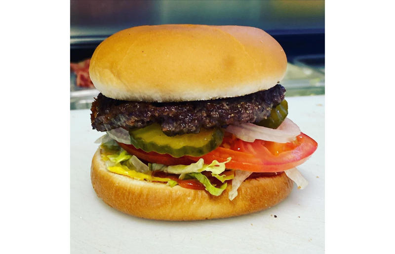 Florida: hamburger, Mac's Drive-Thru, Gainesville 54. Tennessee: Dyer's Single, Dyer's Burgers, Memphis, 53. Alabama: hamburger, Dub's Burgers, Athens, 52. Connecticut: The Original Burger, Louis' Lunch, New Haven, 51. California: Steakburger, The Apple Pan, Los Angeles, 50. Iowa: hamburger, B-Bops, various locations, 49. Maine: hamburger, Black Cow, Portland, 48. New Jersey: hamburger, White Manna, Hackensack, 47. New Hampshire: hamburger, Gilley’s Diner, Portsmouth, 46. Massachusetts: Hamburg, White Hut, West Springfield, 45. California: hamburger, In-N-Out Burger, various locations, 44. District of Columbia: Farmhouse Burger, Good Stuff Eatery, Georgetown, 43. Mississippi: Slugburger, Latham's Hamburger Inn, New Albany, 42. Utah: Big Ben, Burger Bar, Roy, 41. Wisconsin: hamburger, Sobelman's Pub & Grill, Milwaukee, 40. Wyoming: The Liberty Burger, Liberty Burger, Jackson, 39. Illinois: House-blend prime beef burger, Butcher & The Burger, Chicago, 38. Arizona: The Standard at The Stand Arcadia Burger Shoppe, Phoenix, 37. Colorado: Cricket Burger, The Cherry Cricket, Denver, 36. New York: Luger burger, Peter Luger Steakhouse, New York City, 35. Delaware: FTC, Farmer & the Cow, Wilmington, 34. Minnesota: Jucy Lucy, Matt’s Bar, Minneapolis, 33. Pennsylvania: hamburger, M2O Burgers & Salads, Philadelphia, 32. South Carolina: Classic, Big Gun Burger Shop, Charleston, 31. Idaho: The Classic, Holy Cow!, Nampa, 30. Kansas: House Burger, Dempsey's Burger Pub, Wichita, 29. Missouri: hamburger, Town Topic, Kansas City, 28. Nebraska: The Original, Cheeseburgers, Omaha, 27. New Mexico: Rustic, Rustic On The Green, Albuquerque, 26. Indiana: Smash burger, Workingman’s Friend, Indianapolis, 25. Vermont: Worthy Burger, Worthy Burger, South Royalton and Woodstock, 24. Arkansas: traditional hamburger, Hugo's, Fayetteville, 23. Texas: Tookie's Burger, Tookie's Hamburgers & More, Kemah, 22. Nevada: Plain Jane, Beefy's, Reno, 21. Georgia: Green Truck Classic, Green Truck Pub, Savannah, 20. New York: hamburger, All-American Hamburger Drive-In, Massapequa, 19. North Dakota: Carport, Sickies Garage Burgers & Brews, various locations, 18. Michigan: sliders, Motz’s Burgers, Detroit, 17. Michigan: Ground Round, Miller’s Bar, Dearborn, 16. Florida: hamburger, Mac's Drive-Thru, Gainesville, 15. West Virginia: Oscar, Oscar’s Breakfast, Burgers & Brews, Barboursville, 14. North Carolina: hamburger, Brooks’ Sandwich House, Charlotte, 13. Kentucky: The Purist, Bard's Burgers & Chili, Covington, 12. Maryland: Hamburger, Burger Bros., Towson, 11. Oklahoma: single onion burger, Tucker's Onion Burgers, various locations, 10. Rhode Island: Stanley Burger, Stanley’s Famous Hamburgers, Central Falls, 9. Virginia: Beauvine, Beauvine Burger Concept, Richmond, 8. Oregon: The Original 100, Hwy 101 Burger, Lincoln City, 7. Ohio: hamburger, Kewpee Hamburgers, Lima, 6. Hawaii: hamburger, Kua Aina Sandwich Shop, Haleiwa, 5. Alaska: The Burger Stop, Tommy's Burger Stop, Anchorage, 4. Montana: Hamburger, The Burger Drive, Billings, 3. Washington: Seattle Classic, Von's 1000 Spirits, Seattle, 2. Louisiana: Butcher Burger, Cochon Butcher, New Orleans