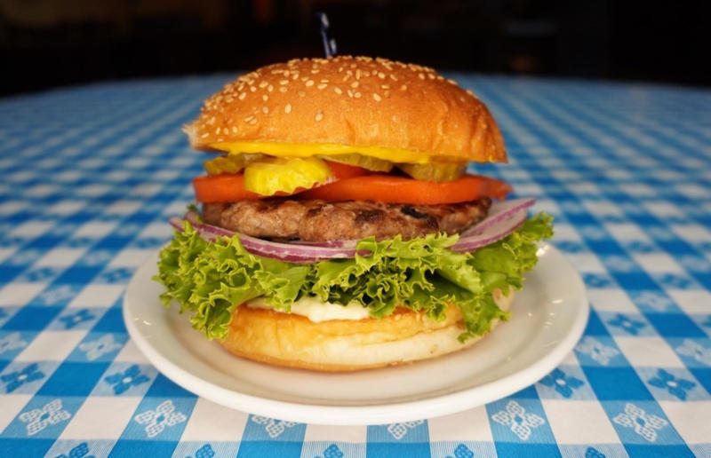 Arkansas: traditional hamburger, Hugo's, Fayetteville 54. Tennessee: Dyer's Single, Dyer's Burgers, Memphis, 53. Alabama: hamburger, Dub's Burgers, Athens, 52. Connecticut: The Original Burger, Louis' Lunch, New Haven, 51. California: Steakburger, The Apple Pan, Los Angeles, 50. Iowa: hamburger, B-Bops, various locations, 49. Maine: hamburger, Black Cow, Portland, 48. New Jersey: hamburger, White Manna, Hackensack, 47. New Hampshire: hamburger, Gilley’s Diner, Portsmouth, 46. Massachusetts: Hamburg, White Hut, West Springfield, 45. California: hamburger, In-N-Out Burger, various locations, 44. District of Columbia: Farmhouse Burger, Good Stuff Eatery, Georgetown, 43. Mississippi: Slugburger, Latham's Hamburger Inn, New Albany, 42. Utah: Big Ben, Burger Bar, Roy, 41. Wisconsin: hamburger, Sobelman's Pub & Grill, Milwaukee, 40. Wyoming: The Liberty Burger, Liberty Burger, Jackson, 39. Illinois: House-blend prime beef burger, Butcher & The Burger, Chicago, 38. Arizona: The Standard at The Stand Arcadia Burger Shoppe, Phoenix, 37. Colorado: Cricket Burger, The Cherry Cricket, Denver, 36. New York: Luger burger, Peter Luger Steakhouse, New York City, 35. Delaware: FTC, Farmer & the Cow, Wilmington, 34. Minnesota: Jucy Lucy, Matt’s Bar, Minneapolis, 33. Pennsylvania: hamburger, M2O Burgers & Salads, Philadelphia, 32. South Carolina: Classic, Big Gun Burger Shop, Charleston, 31. Idaho: The Classic, Holy Cow!, Nampa, 30. Kansas: House Burger, Dempsey's Burger Pub, Wichita, 29. Missouri: hamburger, Town Topic, Kansas City, 28. Nebraska: The Original, Cheeseburgers, Omaha, 27. New Mexico: Rustic, Rustic On The Green, Albuquerque, 26. Indiana: Smash burger, Workingman’s Friend, Indianapolis, 25. Vermont: Worthy Burger, Worthy Burger, South Royalton and Woodstock, 24. Arkansas: traditional hamburger, Hugo's, Fayetteville, 23. Texas: Tookie's Burger, Tookie's Hamburgers & More, Kemah, 22. Nevada: Plain Jane, Beefy's, Reno, 21. Georgia: Green Truck Classic, Green Truck Pub, Savannah, 20. New York: hamburger, All-American Hamburger Drive-In, Massapequa, 19. North Dakota: Carport, Sickies Garage Burgers & Brews, various locations, 18. Michigan: sliders, Motz’s Burgers, Detroit, 17. Michigan: Ground Round, Miller’s Bar, Dearborn, 16. Florida: hamburger, Mac's Drive-Thru, Gainesville, 15. West Virginia: Oscar, Oscar’s Breakfast, Burgers & Brews, Barboursville, 14. North Carolina: hamburger, Brooks’ Sandwich House, Charlotte, 13. Kentucky: The Purist, Bard's Burgers & Chili, Covington, 12. Maryland: Hamburger, Burger Bros., Towson, 11. Oklahoma: single onion burger, Tucker's Onion Burgers, various locations, 10. Rhode Island: Stanley Burger, Stanley’s Famous Hamburgers, Central Falls, 9. Virginia: Beauvine, Beauvine Burger Concept, Richmond, 8. Oregon: The Original 100, Hwy 101 Burger, Lincoln City, 7. Ohio: hamburger, Kewpee Hamburgers, Lima, 6. Hawaii: hamburger, Kua Aina Sandwich Shop, Haleiwa, 5. Alaska: The Burger Stop, Tommy's Burger Stop, Anchorage, 4. Montana: Hamburger, The Burger Drive, Billings, 3. Washington: Seattle Classic, Von's 1000 Spirits, Seattle, 2. Louisiana: Butcher Burger, Cochon Butcher, New Orleans