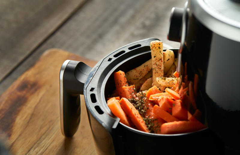 Over-filling the basket Air fryer errors, Over-filling the basket, Forgetting to clean after each use, Not giving your air fryer enough space, Buying the wrong size, Neglecting to preheat your air fryer, Treating it like a conventional oven, Not checking food as it cooks, Skipping the oil, Using the wrong setting, Lining the whole basket, Not using a liner at all, Allowing your food to stick to the basket, Not soaking your chips first, Trying to make toast, Failing to shake the basket during cooking, Forgetting to flip food halfway through cooking, Cooking food with wet or loose batters, Cooking breaded foods incorrectly, Adding cheese to burgers too soon, Attempting to cook popcorn, Trying to bake deep or large cakes, Not using it for muffins, Trying to cook leafy greens, Over (or under) cooking meat, Only cooking fresh vegetables, Losing out on leftovers, Not using it for frozen snacks