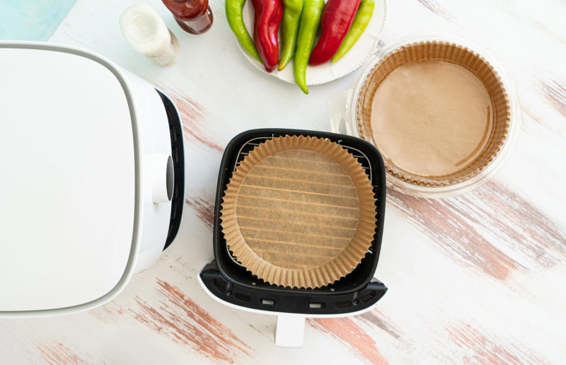 Not using a liner at all Air fryer errors, Over-filling the basket, Forgetting to clean after each use, Not giving your air fryer enough space, Buying the wrong size, Neglecting to preheat your air fryer, Treating it like a conventional oven, Not checking food as it cooks, Skipping the oil, Using the wrong setting, Lining the whole basket, Not using a liner at all, Allowing your food to stick to the basket, Not soaking your chips first, Trying to make toast, Failing to shake the basket during cooking, Forgetting to flip food halfway through cooking, Cooking food with wet or loose batters, Cooking breaded foods incorrectly, Adding cheese to burgers too soon, Attempting to cook popcorn, Trying to bake deep or large cakes, Not using it for muffins, Trying to cook leafy greens, Over (or under) cooking meat, Only cooking fresh vegetables, Losing out on leftovers, Not using it for frozen snacks