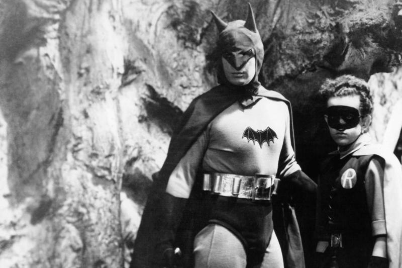 All the faces of Batman, Lewis Wilson in 'Batman' (1943), Robert Lowery in 'Batman and Robin' (1949), Adam West in 'Batman' (1966–1968) and 'Batman: The Movie' (1966), Michael Keaton in 'Batman' (1989) and 'Batman Returns' (1992), Val Kilmer in 'Batman Forever' (1995), George Clooney in 'Batman and Robin' (1997), Ben Affleck in 'Batman v Superman: Dawn of Justice' (2016), 'Justice League' (2017/2021), David Mazouz in 'Gotham' (2014–2019), Iain Glen in 'Titans' (2019–2023), Robert Pattinson in 'The Batman' (2022)