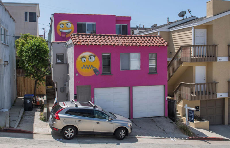 Airbnb host riled neighbours with pink emoji paint job Surprising real estate spats from around the globe, Homeowner built fence through neighbour's swimming pool, Woman gave house 'circus' makeover after planning complaints, Ruffled residents take action against rowdy roosters, Man builds three-foot-wide house to block neighbour’s outlook, Goalkeeper took chainsaw to neighbour’s garage over obstructed view, Neighbours' tree cut in half over bird mess, Neighbours' tree cut in half over bird poo squabble, Millionaire couple sued by neighbours over supercar headache, Airbnb host riled neighbours with pink emoji paint job, Civil War veteran built skinny house to spite his brother, Vegan sued neighbours over barbecue smells, Neighbour filed noise complaint over rowdy sea lions, Disgruntled man listed part of homeowner's wall for £37k