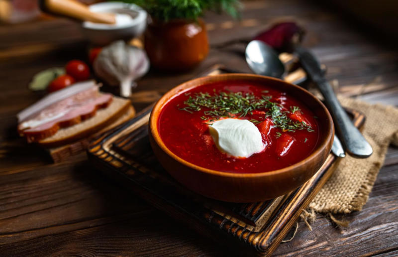 6. Borscht, Ukraine 29. Tortilla de patatas, Spain, 28. Dublin coddle, Ireland, 27. Meatballs, Sweden, 26. Pierogi, Poland, 25. Wiener schnitzel, Austria, 24. Cheese fondue, Switzerland, 23. Bitterballen, Netherlands, 22. Congee, China, 21. Beef stroganoff, Russia, 20. Goulash, Hungary, 19. Sopa Azteca, Mexico, 18. Shakshuka, North Africa, 17. Spätzle, Germany, 16. Khichdi, India, 15. Bobotie, South Africa, 14. Feijoada, Brazil, 13. Kimchi-jjigae, South Korea, 12. Meat pies, Australia, 11. Poutine, Canada, 10. Shepherd's pie, UK and Ireland, 9. Koshary, Egypt, 8. Mac 'n' cheese, USA, 7. Curry udon, Japan, 6. Borscht, Ukraine, 5. Moussaka, Greece, 4. Onion soup, France, 3. Fish and chips, UK, 2. Grilled cheese sandwich, USA