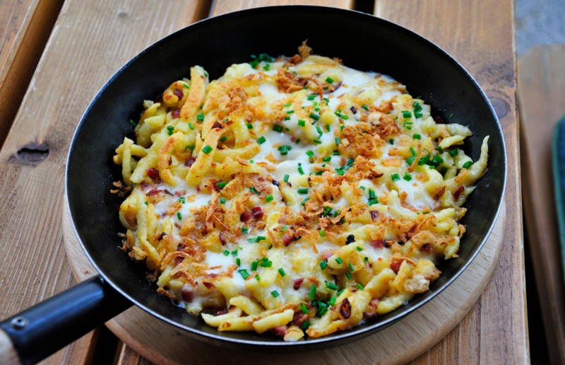 17. Spätzle, Germany 29. Tortilla de patatas, Spain, 28. Dublin coddle, Ireland, 27. Meatballs, Sweden, 26. Pierogi, Poland, 25. Wiener schnitzel, Austria, 24. Cheese fondue, Switzerland, 23. Bitterballen, Netherlands, 22. Congee, China, 21. Beef stroganoff, Russia, 20. Goulash, Hungary, 19. Sopa Azteca, Mexico, 18. Shakshuka, North Africa, 17. Spätzle, Germany, 16. Khichdi, India, 15. Bobotie, South Africa, 14. Feijoada, Brazil, 13. Kimchi-jjigae, South Korea, 12. Meat pies, Australia, 11. Poutine, Canada, 10. Shepherd's pie, UK and Ireland, 9. Koshary, Egypt, 8. Mac 'n' cheese, USA, 7. Curry udon, Japan, 6. Borscht, Ukraine, 5. Moussaka, Greece, 4. Onion soup, France, 3. Fish and chips, UK, 2. Grilled cheese sandwich, USA