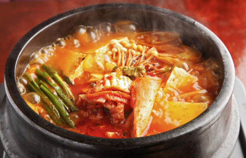 13. Kimchi-jjigae, South Korea 29. Tortilla de patatas, Spain, 28. Dublin coddle, Ireland, 27. Meatballs, Sweden, 26. Pierogi, Poland, 25. Wiener schnitzel, Austria, 24. Cheese fondue, Switzerland, 23. Bitterballen, Netherlands, 22. Congee, China, 21. Beef stroganoff, Russia, 20. Goulash, Hungary, 19. Sopa Azteca, Mexico, 18. Shakshuka, North Africa, 17. Spätzle, Germany, 16. Khichdi, India, 15. Bobotie, South Africa, 14. Feijoada, Brazil, 13. Kimchi-jjigae, South Korea, 12. Meat pies, Australia, 11. Poutine, Canada, 10. Shepherd's pie, UK and Ireland, 9. Koshary, Egypt, 8. Mac 'n' cheese, USA, 7. Curry udon, Japan, 6. Borscht, Ukraine, 5. Moussaka, Greece, 4. Onion soup, France, 3. Fish and chips, UK, 2. Grilled cheese sandwich, USA