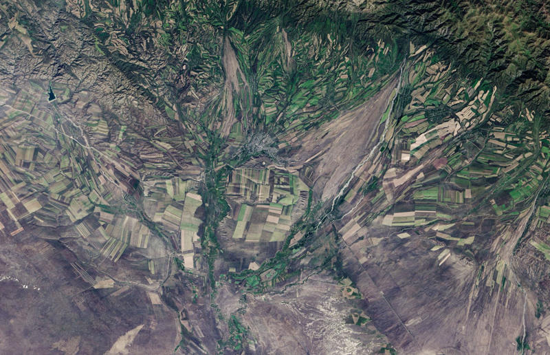 Kazakhstan farmland in the autumn High art, Mountain pass, Romania, Tulip fields, the Netherlands, Mine in Xinjiang, China, Ice sheet, Greenland, Lluta River, Chile, The Dead Sea, Israel and Jordan, Terraced rice fields, Vietnam, Bangkok interchange, Thailand, Pink Lake, Western Australia, Australia, The Great Barrier Reef, Queensland, Australia, Container port, California, USA, A solar farm, California, USA, Farmland, Kazakhstan, Staircase in the Vatican Museums, Italy, Hallstatt in winter, Austria, The Nile, Egypt, Ratchada Train Market, Thailand, Chalk Horse, England, UK, Jodhpur, India, Okavango Delta, Botswana, Tuscan countryside, Italy, John Deere tractor, Italy, The Nazca Lines, Peru, Yellowstone National Park, Wyoming, USA, Abandoned Housing Development, Arizona, USA, Holmes Beach on Anna Maria Island, Florida, USA, Orchard near Siem Reap, Cambodia, Sand dune in the Namib Desert, Namibia, Salt lakes in China's Shanxi Province, Combine harvester, England, UK, Laguna Rosa, Spain, Haida Gwaii, British Columbia, Canada