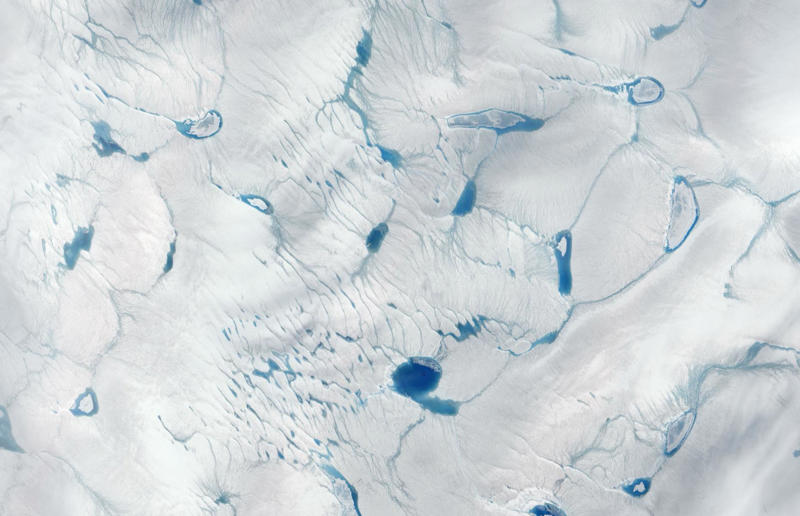Greenland ice sheet High art, Mine in Xinjiang, China, Mountain pass in Transylvania, Romania, Greenland ice sheet, Lluta River, Atacama Desert, Chile, The Dead Sea, Israel and Jordan, Terraced rice fields in Vietnam, Bangkok interchange, Thailand, Pink Lake in Western Australia, The Great Barrier Reef, Australia, Los Angeles container port, USA, A solar farm in California, USA, Kazakhstan farmland in the autumn, Phytoplankton bloom in the Barents Sea, Russia, Staircase in the Vatican Museums, Italy, Hallstatt in winter, Austria, The Nile in Egypt, Bangkok's Ratchada Train Market, Thailand, England's Chalk Horse, UK, Jodhpur, India, Okavango Delta, Botswana, The Italian countryside, Tuscany, The Italian countryside, Pavia, The Nazca Lines in Peru, Yellowstone National Park, Wyoming, USA, Abandoned Housing Development in Phoenix, Arizona, USA, Holmes Beach on Anna Maria Island in Florida, USA, Orchard near Siem Reap, Cambodia, Sand dune in the Namib Desert, Namibia