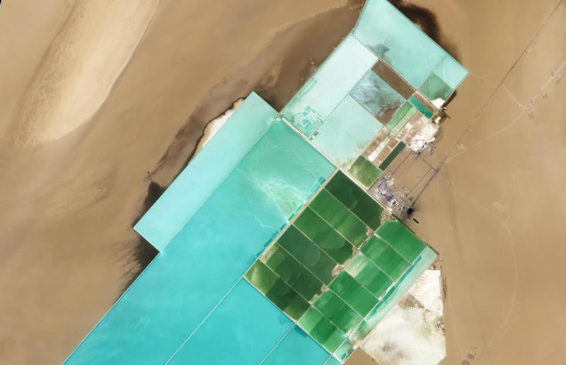 Mine in Xinjiang, China High art, Mine in Xinjiang, China, Mountain pass in Transylvania, Romania, Greenland ice sheet, Lluta River, Atacama Desert, Chile, The Dead Sea, Israel and Jordan, Terraced rice fields in Vietnam, Bangkok interchange, Thailand, Pink Lake in Western Australia, The Great Barrier Reef, Australia, Los Angeles container port, USA, A solar farm in California, USA, Kazakhstan farmland in the autumn, Phytoplankton bloom in the Barents Sea, Russia, Staircase in the Vatican Museums, Italy, Hallstatt in winter, Austria, The Nile in Egypt, Bangkok's Ratchada Train Market, Thailand, England's Chalk Horse, UK, Jodhpur, India, Okavango Delta, Botswana, The Italian countryside, Tuscany, The Italian countryside, Pavia, The Nazca Lines in Peru, Yellowstone National Park, Wyoming, USA, Abandoned Housing Development in Phoenix, Arizona, USA, Holmes Beach on Anna Maria Island in Florida, USA, Orchard near Siem Reap, Cambodia, Sand dune in the Namib Desert, Namibia