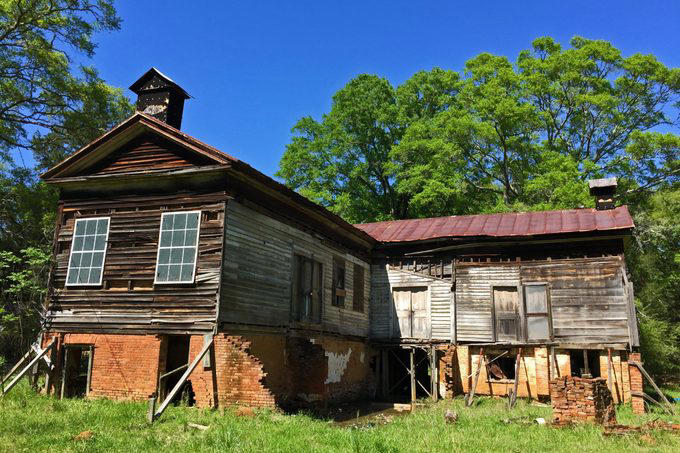 Abandoned places that will give you the chills, Old City Hall Station, 1984 Olympic venues, Ta Prohm Temple, The Pines, Michigan Central Station, Bombay Beach, Hashima Island, Old Cahawba, Castle Frankenstein, Iron Goat Trail, SS Ayrfield, Bedrock City, Gwynned slate quarries, The Astrodome, Seattle Underground, Tillamook Lighthouse, 29 Buffalo Central Terminal, Rhyolite, Presidio Modelo, Cementerio de Trenes, Kolmanskop, Old stairway at Bankhead, Gereja Ayam, St. Kilda, Canfranc railway station, Poveglia, Cape Romano dome house