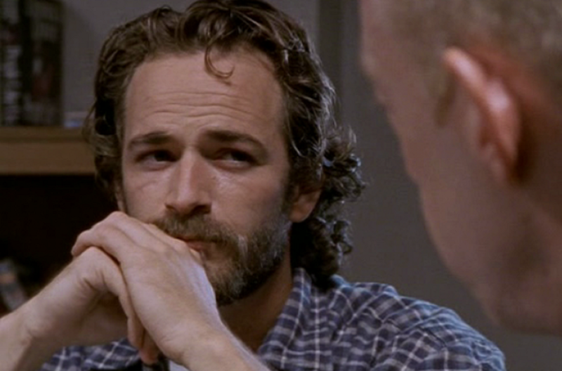 Gone too soon, Luke got lucky when he landed a role on 'Beverly Hills, 90210', Dylan McKay the bad boy everyone loved, Luke was one of THE 90s heartthrobs, Luke took a break from '95-'98 to work on movies, But Luke couldn't resist returning to '90210', Luke marries and becomes a father, Luke struggled to find the same degree of success after '90210', Luke landed starring roles but the shows didn't last long..., Broadway and theatre in London, Luke was even in a Swedish comedy in the mid-2000s, A health scare in 2015, Perry began advocacy work, Luke found his place again on 'Riverdale', Luke Perry wanted to do a reboot of '90210', A reboot in the works??, Fans were thrilled, ...but Luke had a conflict due to his contract with 'Riverdale', Tragedy strikes, Luke was 52 when he passed away, Perry's final role was in a Tarantino film, Luke was secretly engaged at the time of his death, They were said to be "smitten", An icon that is dearly missed