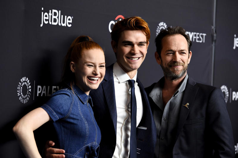 Gone too soon, Luke got lucky when he landed a role on 'Beverly Hills, 90210', Dylan McKay the bad boy everyone loved, Luke was one of THE 90s heartthrobs, Luke took a break from '95-'98 to work on movies, But Luke couldn't resist returning to '90210', Luke marries and becomes a father, Luke struggled to find the same degree of success after '90210', Luke landed starring roles but the shows didn't last long..., Broadway and theatre in London, Luke was even in a Swedish comedy in the mid-2000s, A health scare in 2015, Perry began advocacy work, Luke found his place again on 'Riverdale', Luke Perry wanted to do a reboot of '90210', A reboot in the works??, Fans were thrilled, ...but Luke had a conflict due to his contract with 'Riverdale', Tragedy strikes, Luke was 52 when he passed away, Perry's final role was in a Tarantino film, Luke was secretly engaged at the time of his death, They were said to be "smitten", An icon that is dearly missed