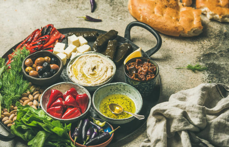 90. Peri peri chicken, Mozambique, 89. Sauerbraten, Germany, 88. Massaman, Thailand, 87. Spanakopita, Cyprus and Greece, 86. Cassoulet, France, 85. Banitsa, Bulgaria, 84. Barramundi, Australia, 83. Pastel de choclo, Chile, 82. Mole, Mexico, 81. Borscht, Ukraine, 80. Plov, Uzbekistan, 79. Bunny chow, South Africa, 78. Käsespätzle/ Käsknöpfle, Central Europe, 77. Chicken rice, Singapore, 76. Adobo, Philippines, 75. Rösti, Switzerland, 74. Falafel, Middle East, 73. Hoppers, Sri Lanka, 72. Nasi lemak, Malaysia, 71. Pupusa, El Salvador, 70. Beef rendang, Indonesia, 69. Tortilla de patatas, Spain, 68. French onion soup, France, 67. Colcannon, Ireland, 66. Bobotie, South Africa, 65. Haggis, Scotland, 64. Tamales, Central and South America, 63. Wiener schnitzel, Austria, 62. Feijoada, Brazil, 61. Souvlaki, Greece, 60. Laksa, Malaysia, 59. Clam chowder, USA, 58. Raclette, Switzerland, 57. Smørrebrød, Denmark, 56. Jollof rice, West Africa, 55. Poutine, Canada, 54. Goulash, Hungary, 53. Pho, Vietnam, 52. Biryani, India, 51. Arepa, Colombia and Venezuela, 50. Shawarma, Middle East, 49. Beef stroganoff, Russia, 48. Som tam, Laos, 47. Cacio e pepe, Italy, 46. Bouillabaisse, France, 45. Khachapuri, Georgia, 44. Ceviche, Peru, 43. Quesadilla, Mexico, 42. Masala dosa, India, 41. Moules frites, Belgium, 40. Köttbullar, Sweden, 39. Welsh rarebit, Wales, 38. Pierogi, Poland, 37. Poke, USA, 36. Tagine, Morocco, 35. Dim sum, China, 34. Gumbo, USA, 33. Kebab, Turkey, 32. Jerk chicken, Jamaica, 31. Singapore noodles, Hong Kong, 30. Asado, Argentina, 29. Beef Wellington, England, 28. Moussaka, Greece, 27. Tahdig, Iran, 26. Murgh makhani, India, 25. Gnocchi, Italy, 24. Sushi, Japan, 23. Texas-style barbecue, USA, 22. Fish and chips, UK, 21. Carbonara, Italy, 20. Tom yum soup, Thailand, 19. Cataplana, Portugal, 18. Mezze, Middle East, 17. Pad Thai, Thailand, 16. Steak frites, France, 15. Shakshuka, Middle East, 14. Tapas, Spain, 13. Gua bao, Taiwan, 12. Boeuf bourguignon, France, 11. Peking duck, China, 10. Chicken parmigiana, USA, 9. Bibimbap, South Korea, 8. Paella, Spain, 7. Tacos, Mexico, 6. Southern fried chicken, USA, 5. Sausage and mash, UK, 4. Ragù alla Bolognese, Italy, 3. Ramen, Japan, 2. Hamburger, USA