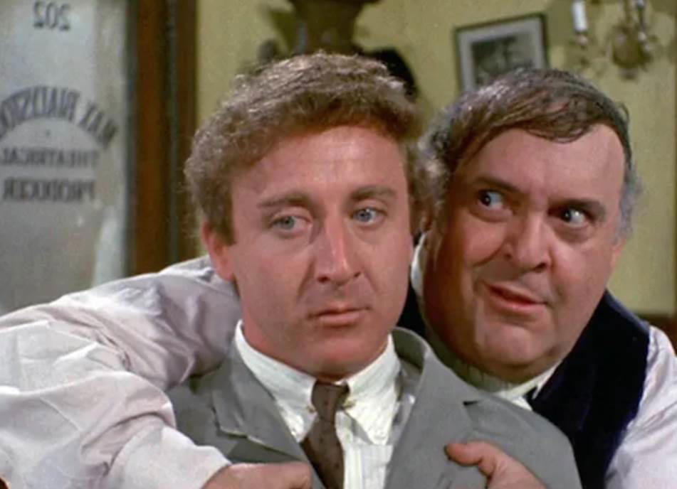 19. The Producers 60. Austin Powers: International Man of Mystery (1997), 59. Booksmart (2019), 58. Bill and Ted's Excellent Adventure (1989), 57. Planes, Trains and Automobiles (1987), 56. School of Rock, 55. The Blues Brothers, 54. Bridesmaids, 53. Talladega Nights: The Ballad of Ricky Bobby, 52. Office Space, 51. Billy Madison, 50. Tommy Boy, 49. The 40 Year Old Virgin, 48. Tootsie, 47. What We Do in the Shadows, 46. Wayne's World, 45. Deadpool, 44. Tropic Thunder, 43. Animal House, 42. The Hangover, 41. Hot Shots!, 40. Ferris Bueller's Day Off, 39. Zoolander, 38. High Fidelity, 37. Clerks, 36. Superbad, 35. Shaun of the Dead, 34. Happy Gilmore, 33. Knocked Up, 32. Meet the Parents, 31. Anchorman: The Legend of Ron Burgundy, 30. The Grand Budapest Hotel, 29. Hot Fuzz, 28. Airplane, 27. This Is Spinal Tap, 26. Borat, 25. The General, 24. There's Something About Mary, 23. The Apartment, 22. Top Secret!, 21. The Great Dictator, 20. Coming to America, 19. The Producers, 18. Manhattan, 17. Juno, 16. Young Frankenstein, 15. In Bruges, 14. Some Like It Hot, 13. Trading Places, 12. Modern Times, 11. Blazing Saddles, 10. Dumb and Dumber, 09. Midnight Run, 08. The Naked Gun, 07. Dr. Strangelove or: How I Learned to Stop Worrying and Love the Bomb, 06. Annie Hall, 05. Life of Brian, 04. Groundhog Day, 03. Ghostbusters, 02. The Big Lebowski, 01. Monty Python and the Holy Grail