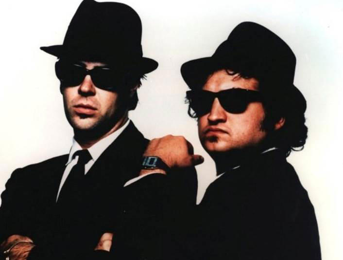 55. The Blues Brothers 60. Austin Powers: International Man of Mystery (1997), 59. Booksmart (2019), 58. Bill and Ted's Excellent Adventure (1989), 57. Planes, Trains and Automobiles (1987), 56. School of Rock, 55. The Blues Brothers, 54. Bridesmaids, 53. Talladega Nights: The Ballad of Ricky Bobby, 52. Office Space, 51. Billy Madison, 50. Tommy Boy, 49. The 40 Year Old Virgin, 48. Tootsie, 47. What We Do in the Shadows, 46. Wayne's World, 45. Deadpool, 44. Tropic Thunder, 43. Animal House, 42. The Hangover, 41. Hot Shots!, 40. Ferris Bueller's Day Off, 39. Zoolander, 38. High Fidelity, 37. Clerks, 36. Superbad, 35. Shaun of the Dead, 34. Happy Gilmore, 33. Knocked Up, 32. Meet the Parents, 31. Anchorman: The Legend of Ron Burgundy, 30. The Grand Budapest Hotel, 29. Hot Fuzz, 28. Airplane, 27. This Is Spinal Tap, 26. Borat, 25. The General, 24. There's Something About Mary, 23. The Apartment, 22. Top Secret!, 21. The Great Dictator, 20. Coming to America, 19. The Producers, 18. Manhattan, 17. Juno, 16. Young Frankenstein, 15. In Bruges, 14. Some Like It Hot, 13. Trading Places, 12. Modern Times, 11. Blazing Saddles, 10. Dumb and Dumber, 09. Midnight Run, 08. The Naked Gun, 07. Dr. Strangelove or: How I Learned to Stop Worrying and Love the Bomb, 06. Annie Hall, 05. Life of Brian, 04. Groundhog Day, 03. Ghostbusters, 02. The Big Lebowski, 01. Monty Python and the Holy Grail