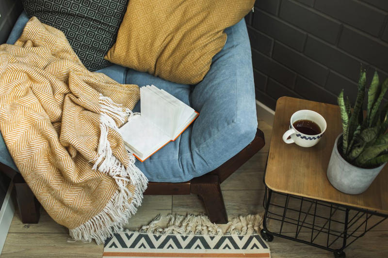 1) Opt for Comfortable Seating, 2) Add Soft Lighting, 3) Pile On the Throws, 4) Put Down a Rug, 5) Add a Fire Pit, 6) Incorporate a Water Feature, 7) Splurge on a Heat Lamp, 8) Make it Feel Secluded, 9) Throw in Some Color, 10) Offer a Variety of Seating Options, 11) Add Some Greenery, 12) Spring for the Hot Tub