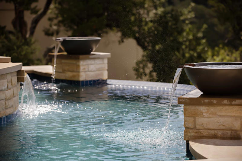 1) Opt for Comfortable Seating, 2) Add Soft Lighting, 3) Pile On the Throws, 4) Put Down a Rug, 5) Add a Fire Pit, 6) Incorporate a Water Feature, 7) Splurge on a Heat Lamp, 8) Make it Feel Secluded, 9) Throw in Some Color, 10) Offer a Variety of Seating Options, 11) Add Some Greenery, 12) Spring for the Hot Tub