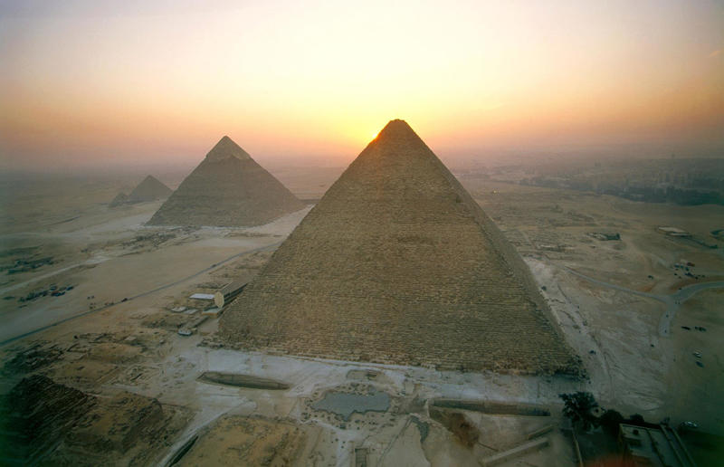 Wonder of the world, The pyramids are very, very, very old, They've witnessed most of human history, The Great Pyramid was the tallest structure in the world for 3,800 years, It's also the only wonder of the ancient world left standing, There's the Khufu Pyramid..., ...the Khafre Pyramid..., ...and the Menkaure Pyramid, We're still not totally sure how they were built, They're architecturally extremely advanced, There are many, many other tombs around the pyramids, They weren't built by slaves, The pyramids' interiors are eerie but unspectacular, The pyramids once looked very different, Why were they built?, Pyramid-building had fallen out of favour by the New Kingdom, Herodotus visited in the 450s BC, The Muslim caliphs were equally impressed, Though one tried to destroy them, Looting and grave-robbing stripped them bare, Napoleon won the so-called 'Battle of the Pyramids', Egypt gained international attention, Egyptology became a fashionable pursuit, Egyptology has attracted criticism, The pyramids were an allied barracks during the First World War, Upper-class tourism started in the 19th century, The pyramids have become a magnet for conspiracy, Air travel and mass tourism changed the game, The pyramids are now used for art and culture..., ...and sometimes for politics