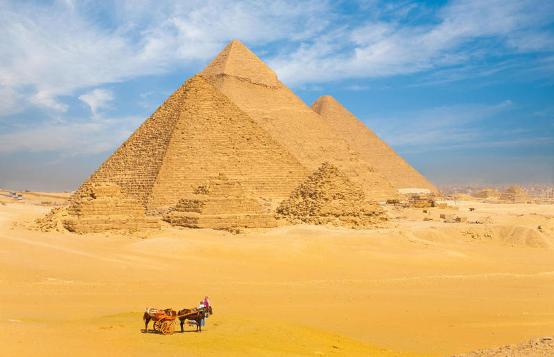 Wonder of the world, The pyramids are very, very, very old, They've witnessed most of human history, The Great Pyramid was the tallest structure in the world for 3,800 years, It's also the only wonder of the ancient world left standing, There's the Khufu Pyramid..., ...the Khafre Pyramid..., ...and the Menkaure Pyramid, We're still not totally sure how they were built, They're architecturally extremely advanced, There are many, many other tombs around the pyramids, They weren't built by slaves, The pyramids' interiors are eerie but unspectacular, The pyramids once looked very different, Why were they built?, Pyramid-building had fallen out of favour by the New Kingdom, Herodotus visited in the 450s BC, The Muslim caliphs were equally impressed, Though one tried to destroy them, Looting and grave-robbing stripped them bare, Napoleon won the so-called 'Battle of the Pyramids', Egypt gained international attention, Egyptology became a fashionable pursuit, Egyptology has attracted criticism, The pyramids were an allied barracks during the First World War, Upper-class tourism started in the 19th century, The pyramids have become a magnet for conspiracy, Air travel and mass tourism changed the game, The pyramids are now used for art and culture..., ...and sometimes for politics