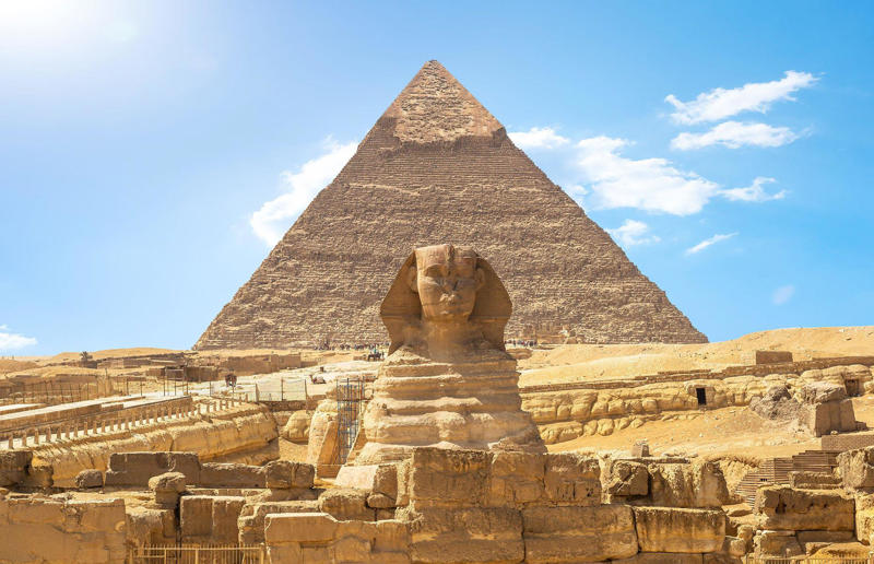 Wonder of the world, The pyramids are very, very, very old, They've witnessed most of human history, The Great Pyramid was the tallest structure in the world for 3,800 years, It's also the only wonder of the ancient world left standing, There's the Khufu Pyramid..., ...the Khafre Pyramid..., ...and the Menkaure Pyramid, We're still not totally sure how they were built, They're architecturally extremely advanced, There are many, many other tombs around the pyramids, They weren't built by slaves, The pyramids' interiors are eerie but unspectacular, The pyramids once looked very different, Why were they built?, Pyramid-building had fallen out of favour by the New Kingdom, Herodotus visited in the 450s BC, The Muslim caliphs were equally impressed, Though one tried to destroy them, Looting and grave-robbing stripped them bare, Napoleon won the so-called 'Battle of the Pyramids', Egypt gained international attention, Egyptology became a fashionable pursuit, Egyptology has attracted criticism, The pyramids were an allied barracks during the First World War, Upper-class tourism started in the 19th century, The pyramids have become a magnet for conspiracy, Air travel and mass tourism changed the game, The pyramids are now used for art and culture..., ...and sometimes for politics