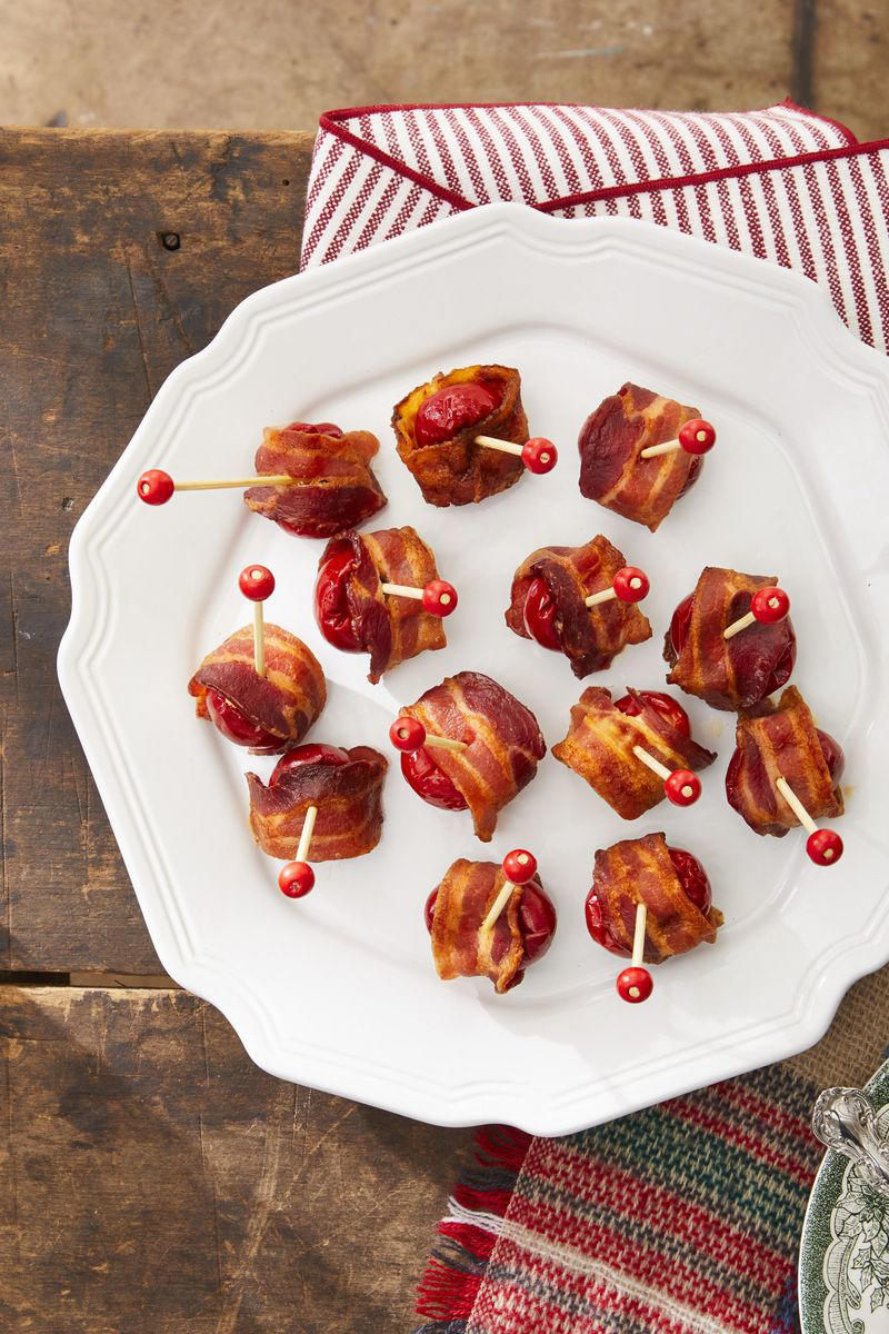 Bacon-Wrapped Stuffed Peppadews, Cheddar Holly Crackers, Christmas Tree Deviled Eggs, Honey-Apple Baked Brie with Fried Sage, Sharp Cheddar Sausage Balls , Warm Crab Dip