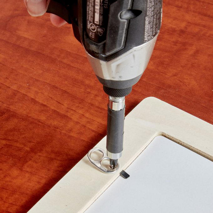 Lickety-Split Wall Decor, Use a Smartphone Level, Use Templates and Tape, A Riveting Idea, Pull Tab Hook, Pinpoint a Solution, Toothpaste Marks the Spot, Measure Everything, Nailed It, Keep It Level, Hang Shelves Instead, Keyhole Template, Sawtooth Tape Measure Hanger
