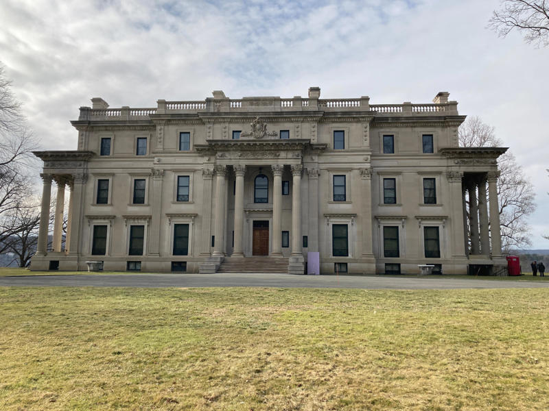 The Vanderbilt Mansion in Hyde Park, New York, was home to one of America's wealthiest families during the Gilded Age. We then walked through the front door into an opulent entrance hall., The space was full of decorative tapestries, sculptures, and other artifacts., Frederick's den functioned as his private leisure space., A grand staircase led to the second floor.