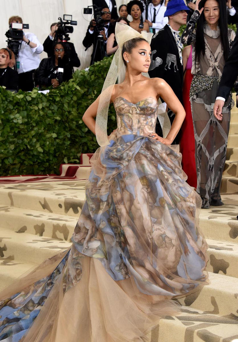 Rihanna in Comme des Garçons, 2017, Zendaya in Versace, 2018, Daphne Guinness in Alexander McQueen, 2011, Solange in Iris van Herpen, 2018, Iman in Stella McCartney, 2007, Kate Moss in Calvin Klein, 1995, Rihanna in Guo Pei, 2015, Sarah Jessica Parker in Alexander McQueen, 2006, Lil’ Kim in Marc Jacobs, 2005, Rosalía in Givenchy, 2022, Ashley Olsen in Dior, 2013, Claire Danes in Zac Posen, 2016, Blake Lively in Versace, 2022, Princess Diana in Dior, 1996, Liv Tyler and Stella McCartney in Stella McCartney, 1999, Mary-Kate and Ashley Olsen in Comme des Garçons, 2017, Frances McDormand in Valentino Couture, 2018, Miuccia Prada in Prada, 2007, Kate Moss in Marc Jacobs, 2009, Zoë Kravitz in Saint Laurent, 2021, Tina Chow, 1980, Kendall Jenner in Givenchy Haute Couture, 2021, Hailey Bieber in Alexander Wang, 2022, Naomi Campbell in Versace, 1995, Madonna in Versace, 1997, Ariana Grande in Vera Wang, 2018, Anja Rubik in Versace, 2012, Rihanna in Maison Margiela, 2018