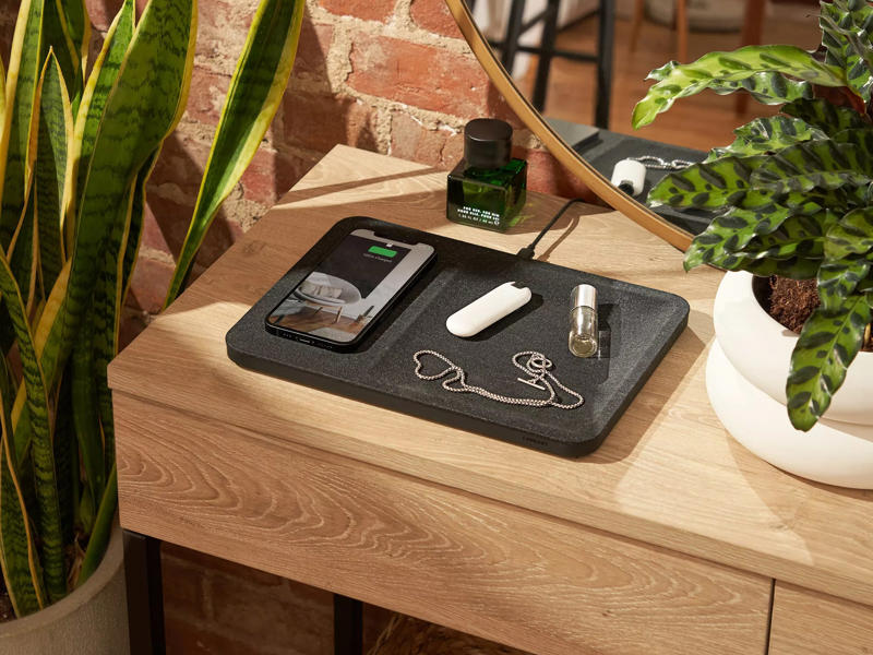 A wireless charging pad A starter watch, A pillow that pays homage to their alma mater, A stylish suitcase, A nice set of dinnerware, A history of their favorite football team, A set of glasses full of school spirit, The newest AirPods, A pleasant way to wake up every day, A toiletry bag to use at home or for travel, A fancy messenger bag, A made-to-measure suit, A handheld massager, A pair of joggers he can wear anywhere, A must-read financial guide book, A food delivery gift card, A customized business card holder, A wireless charging pad, An even easier way to make pasta, A durable mug made for camping and beyond, A new skincare routine, A small but powerful speaker, A speaker that talks to you, A fun mug, An Amazon gift card